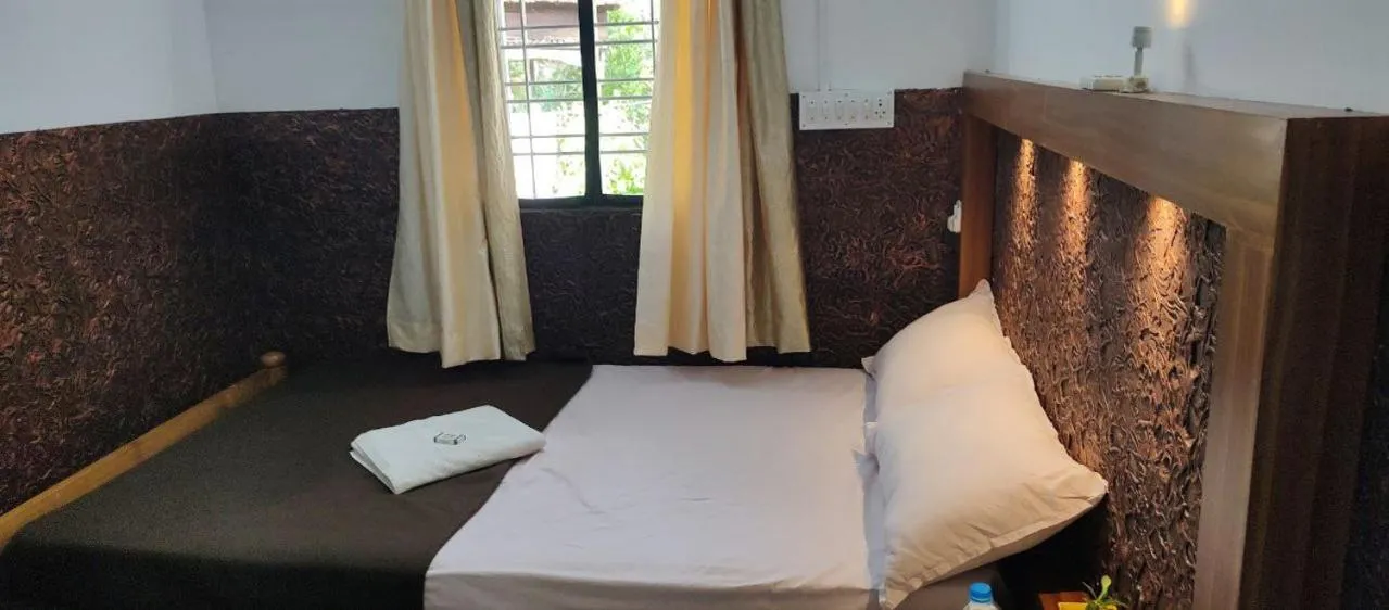Bed in Kalappura Homestay