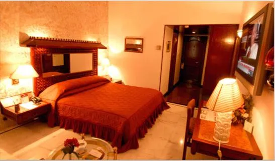 Photo of the whole room, Bed in Ashok Country Resort