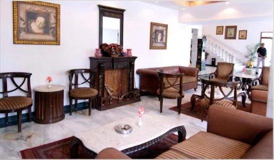 Communal lounge/ TV room in Ashok Country Resort