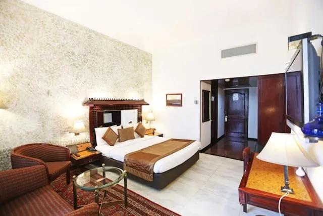 Photo of the whole room, Bed in Ashok Country Resort
