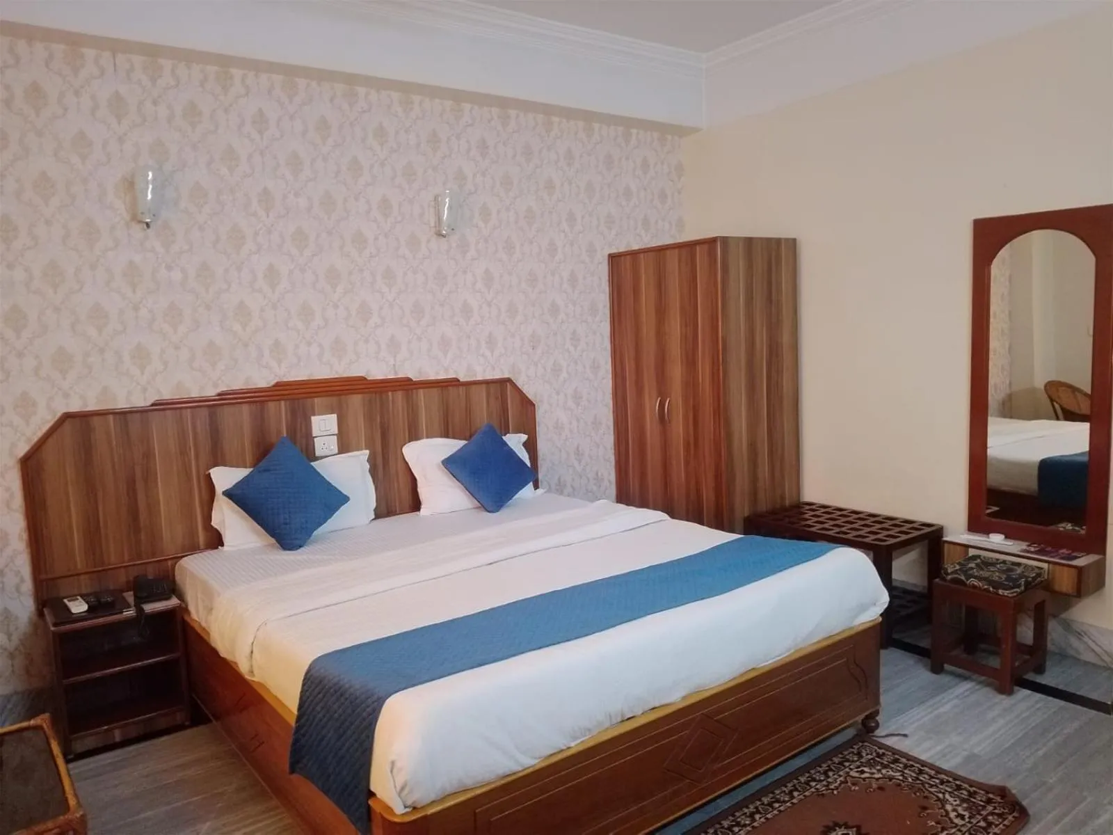 Bed in Hotel Priya Palace