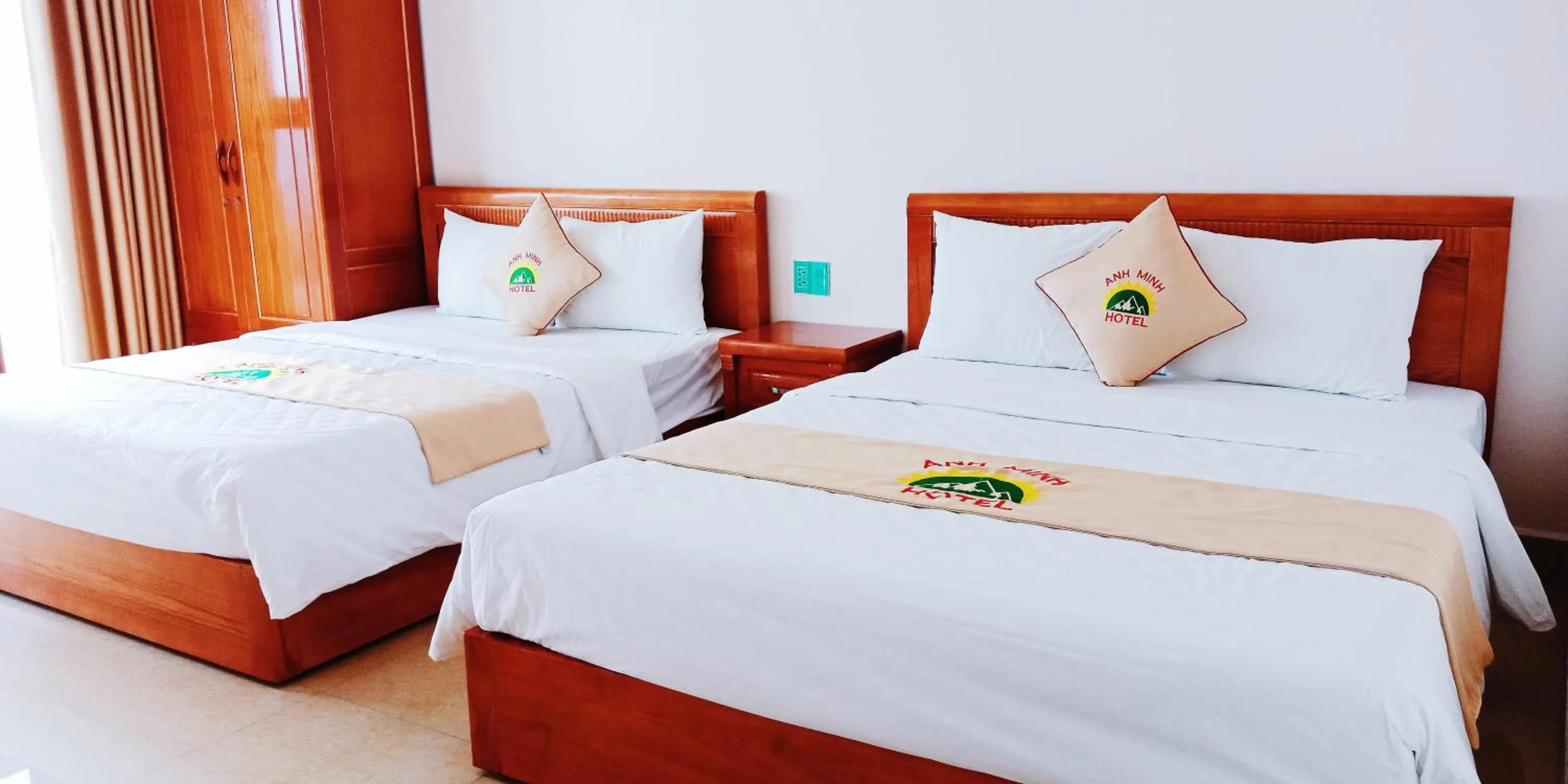 Bed in Anh Minh Hotel