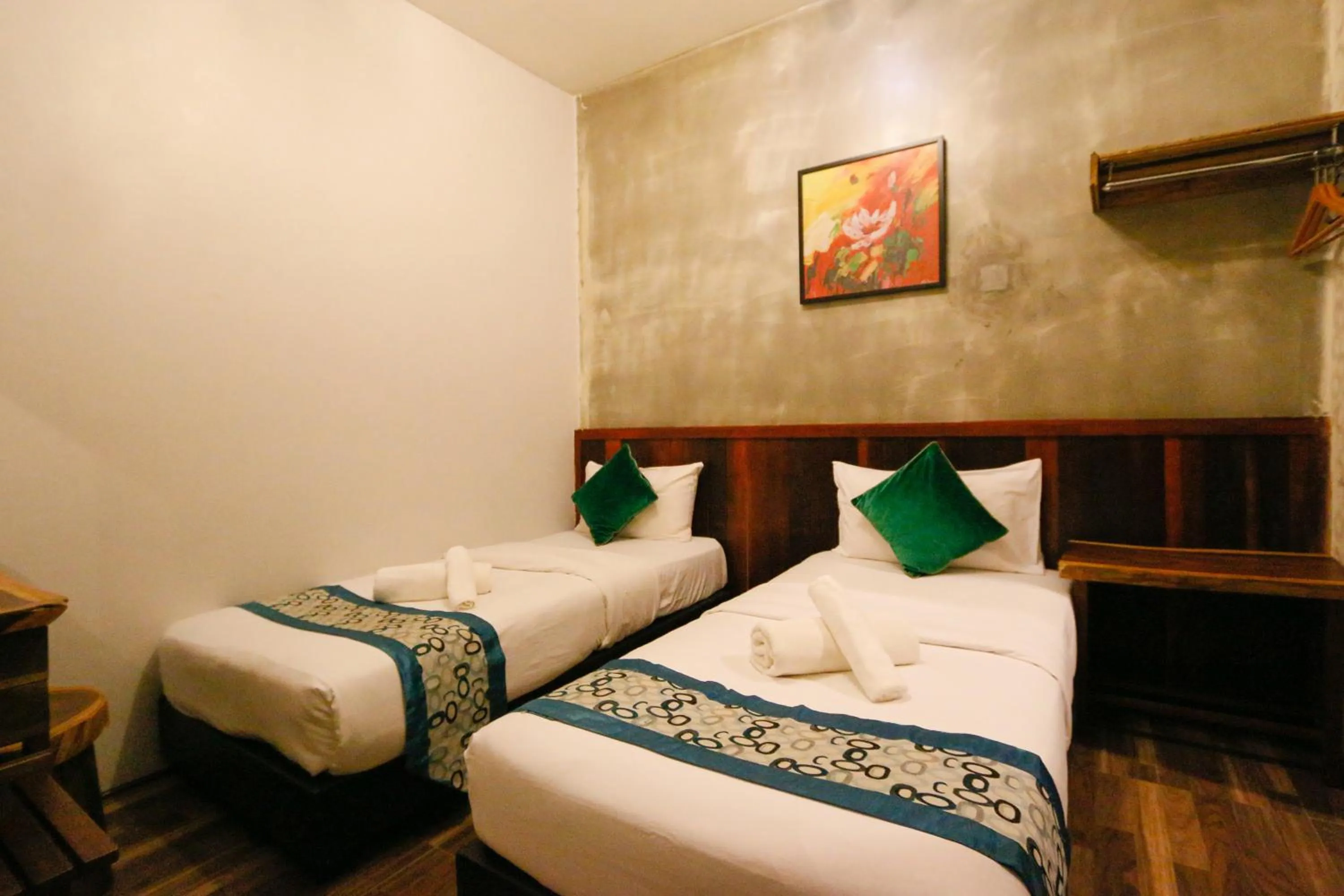Bed in Anggun Hotel