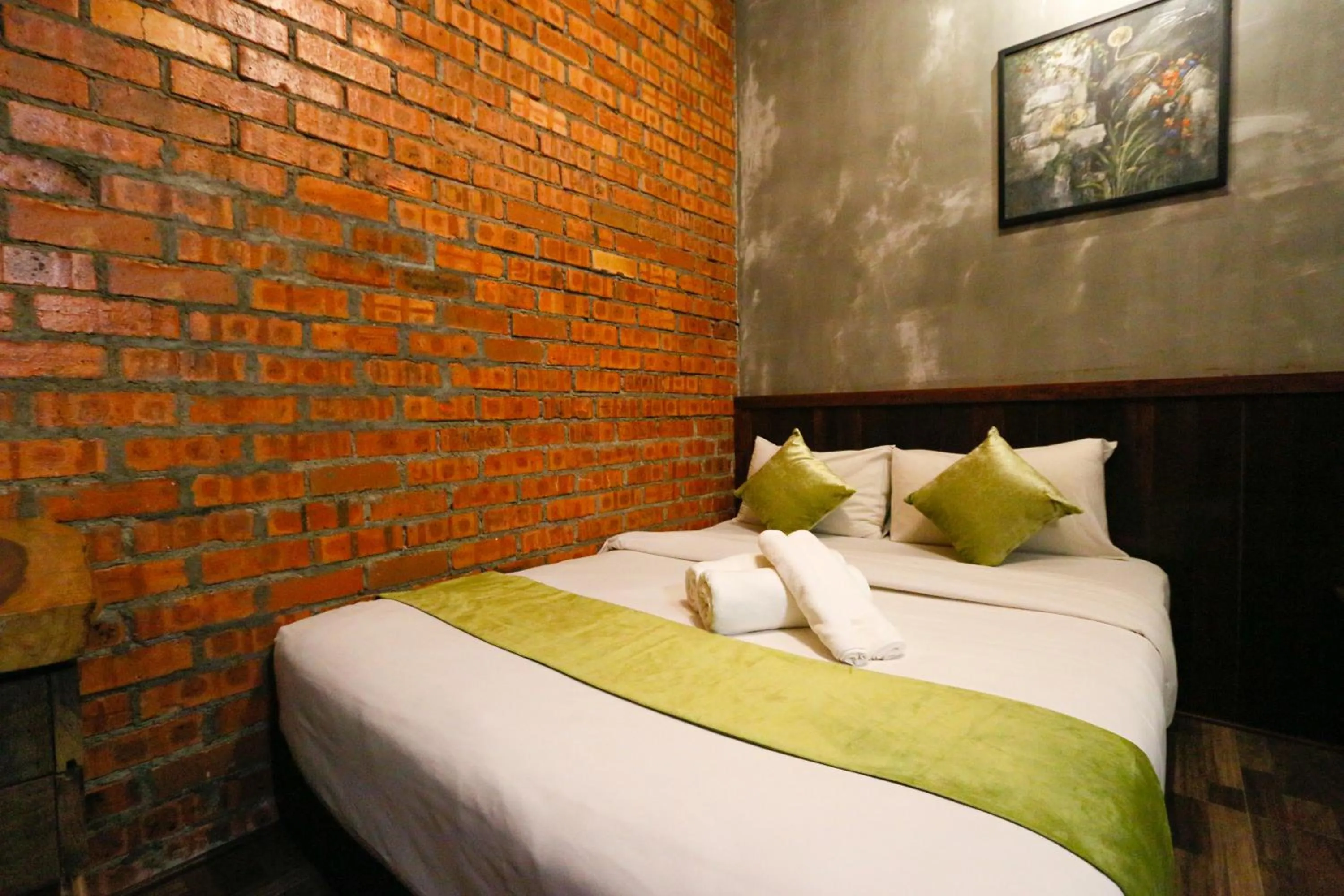 Bed in Anggun Hotel