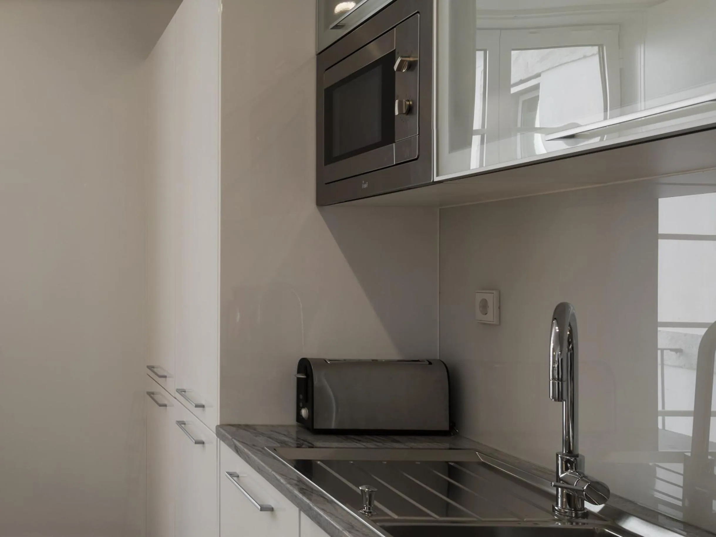 Kitchen or kitchenette in LSA Baixa Castelo by Numa