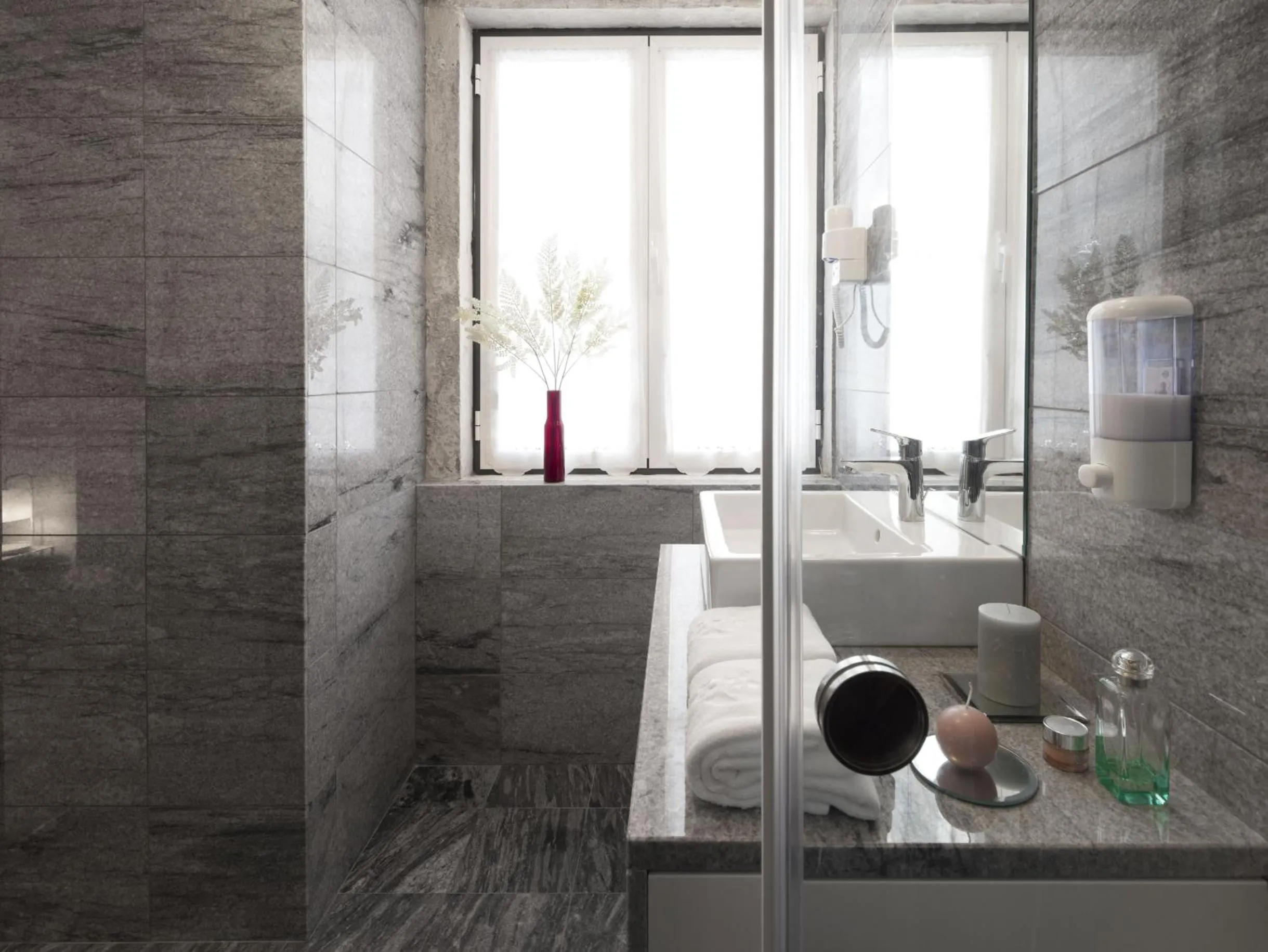 Bathroom in LSA Baixa Castelo by Numa