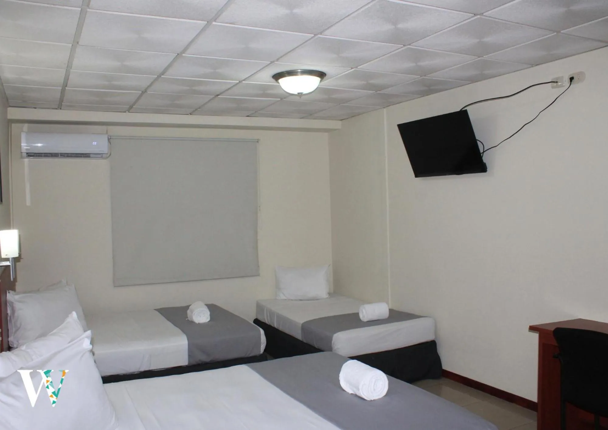 Bed in Hotel Windsor Plaza