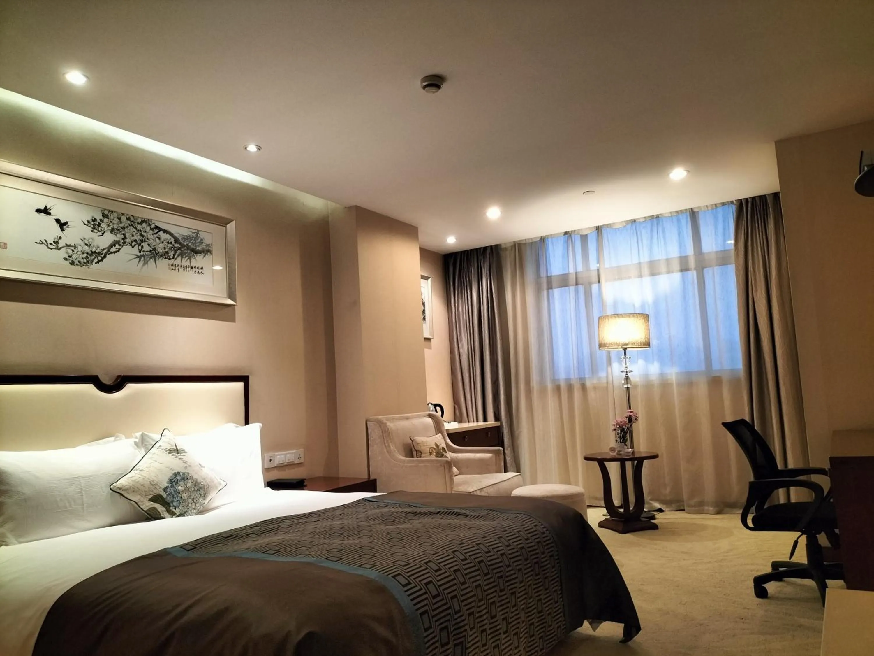 Bed in Landison Plaza International Hotel