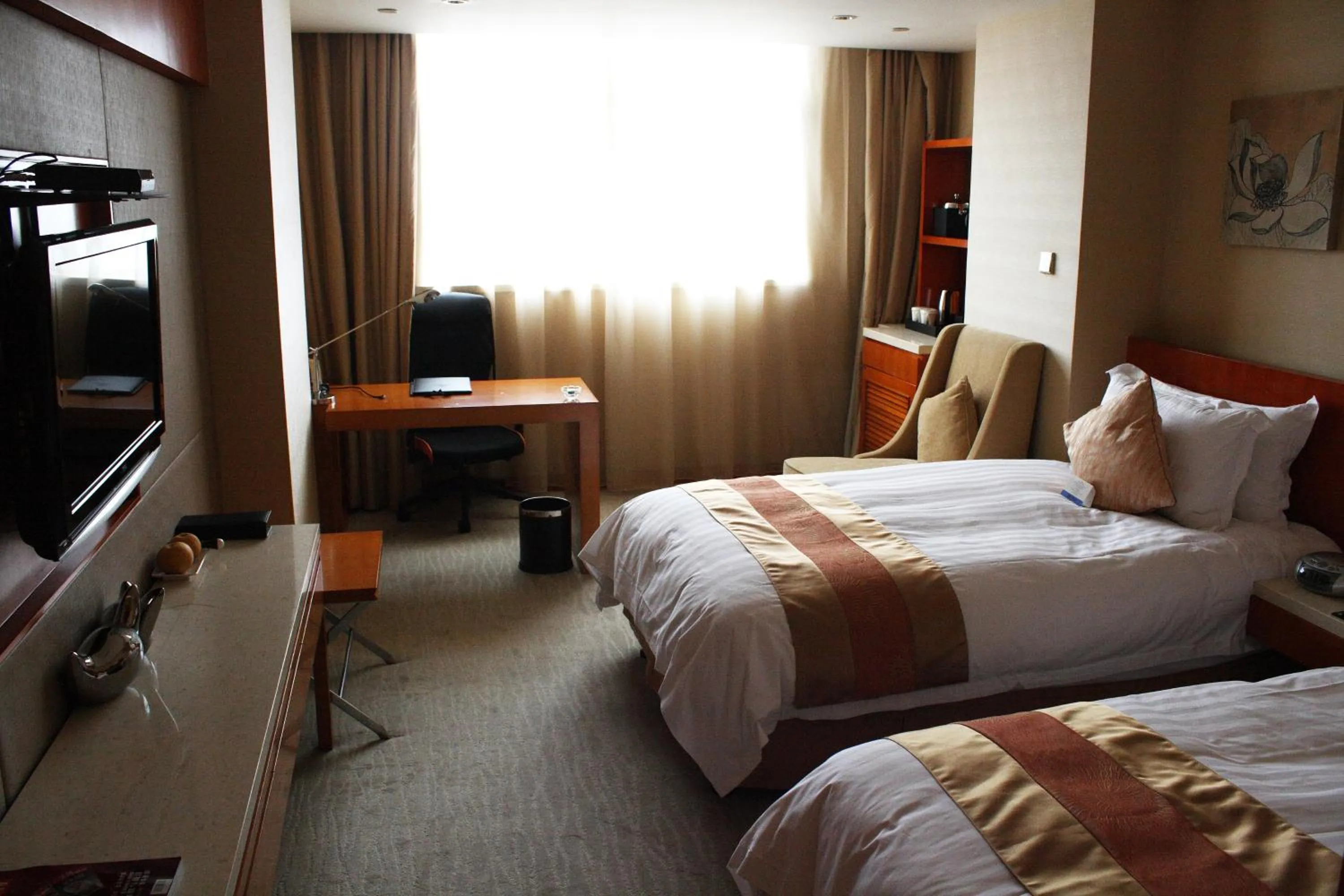 Bedroom in Landison Plaza International Hotel