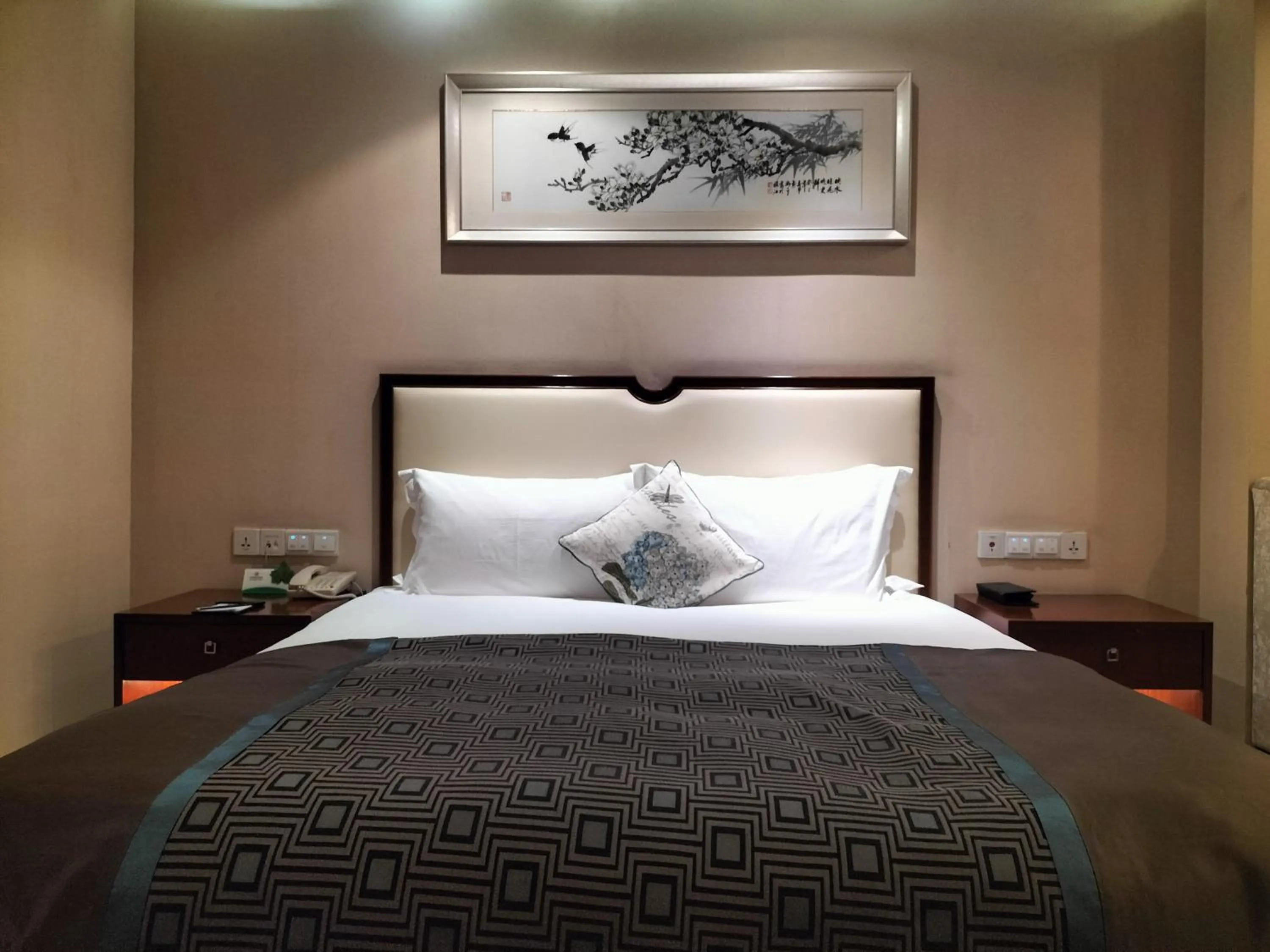 Bed in Landison Plaza International Hotel