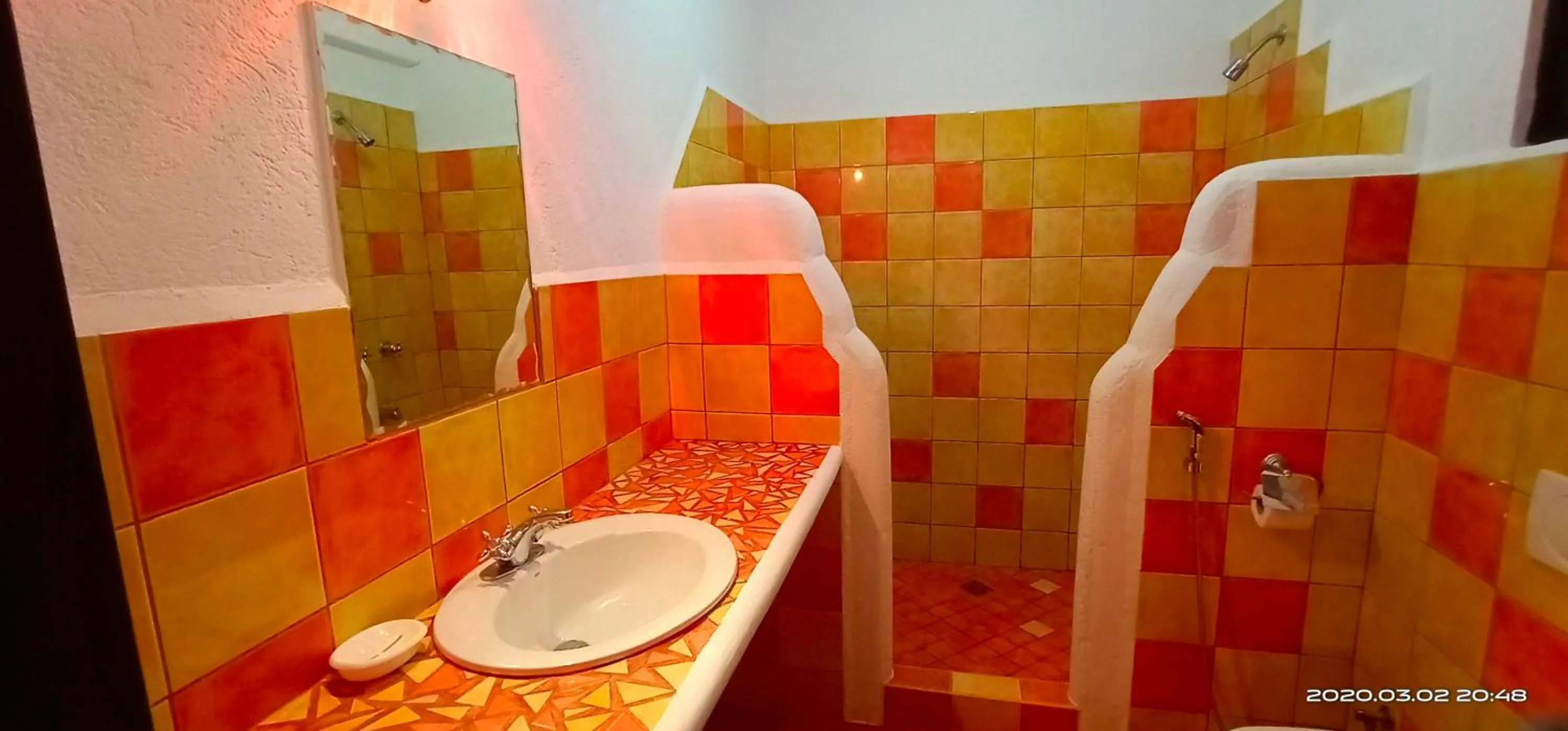 Shower in Aquarius Terraces Boutique Resort