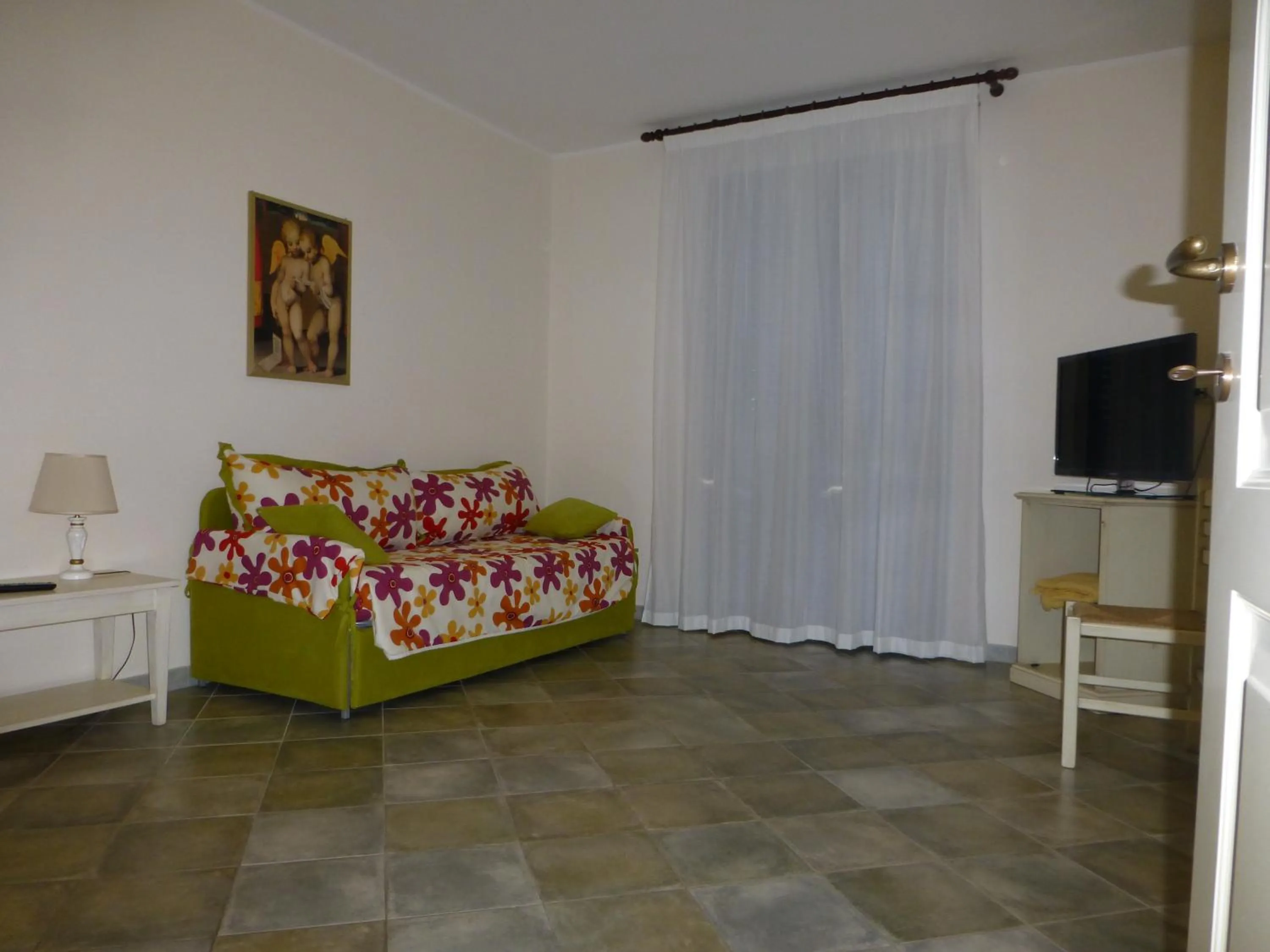 Living room, Bed in Hotel Celeste