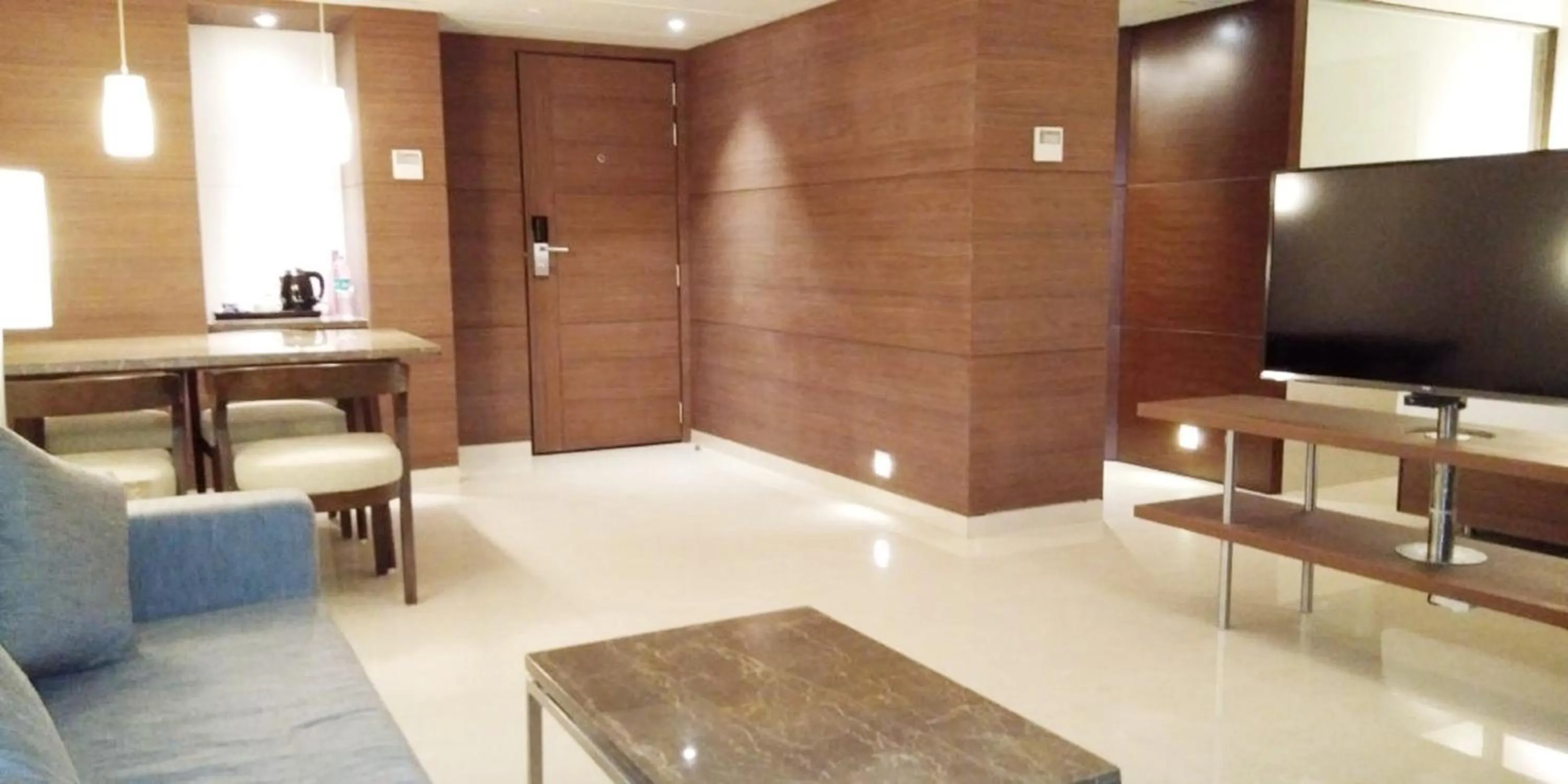 Living room in Krishna Palace Hotel - Ambernath