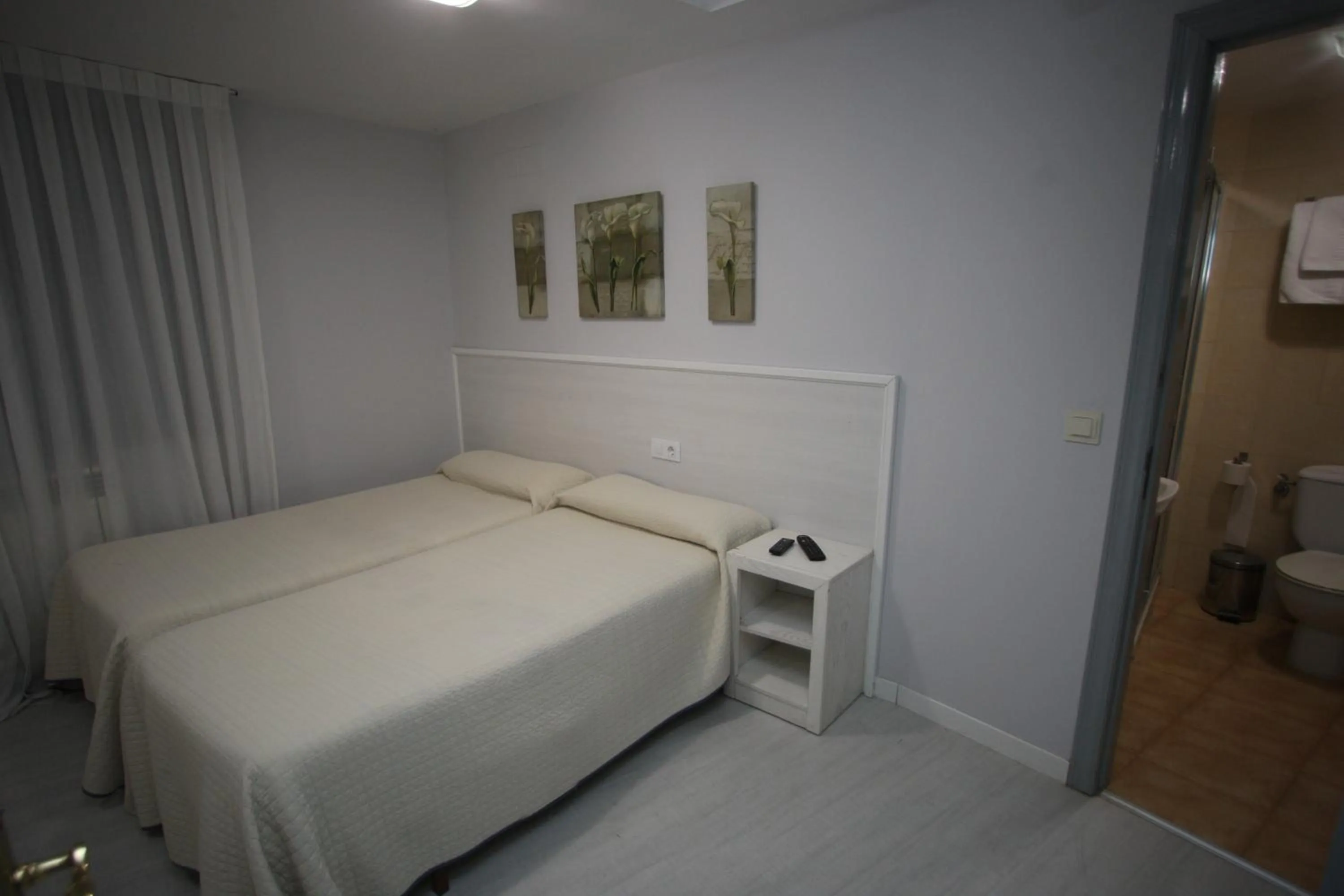 Photo of the whole room, Bed in Hostal Santa Barbara