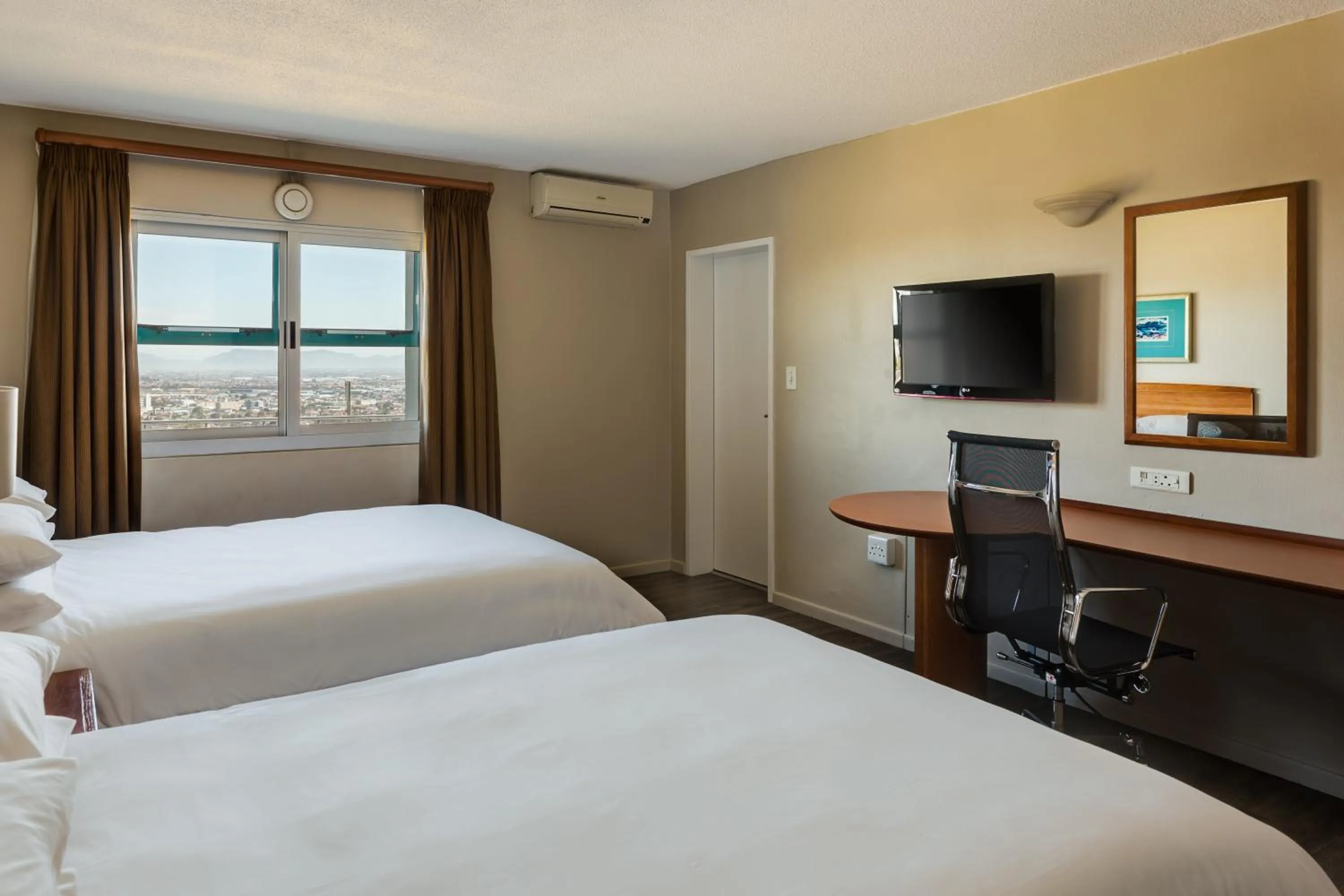 Photo of the whole room, Bed in Protea Hotel by Marriott Cape Town Tyger Valley