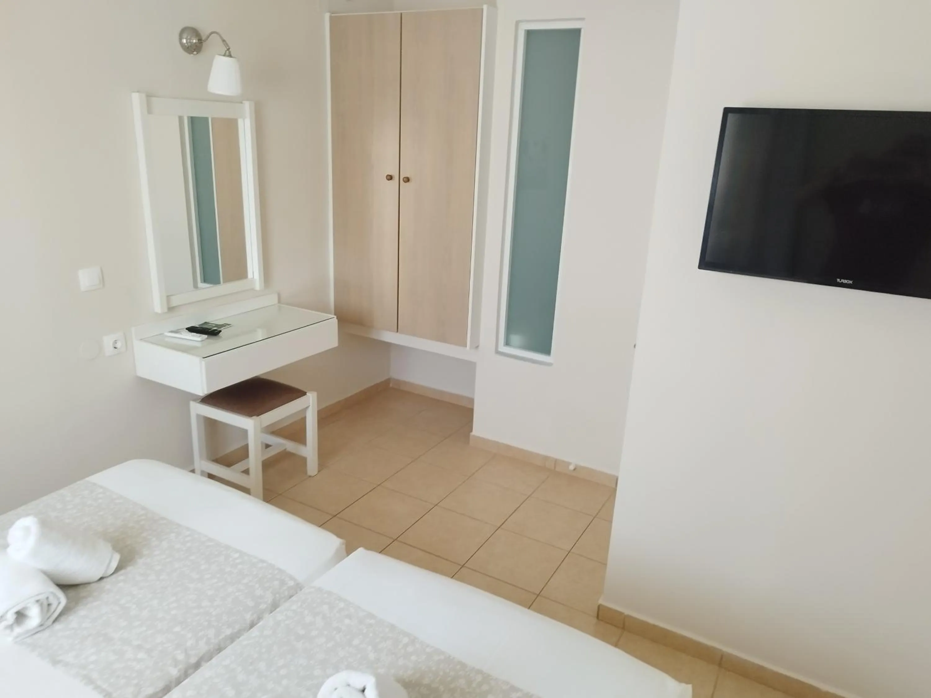 Bed in Blue Sky Apartments