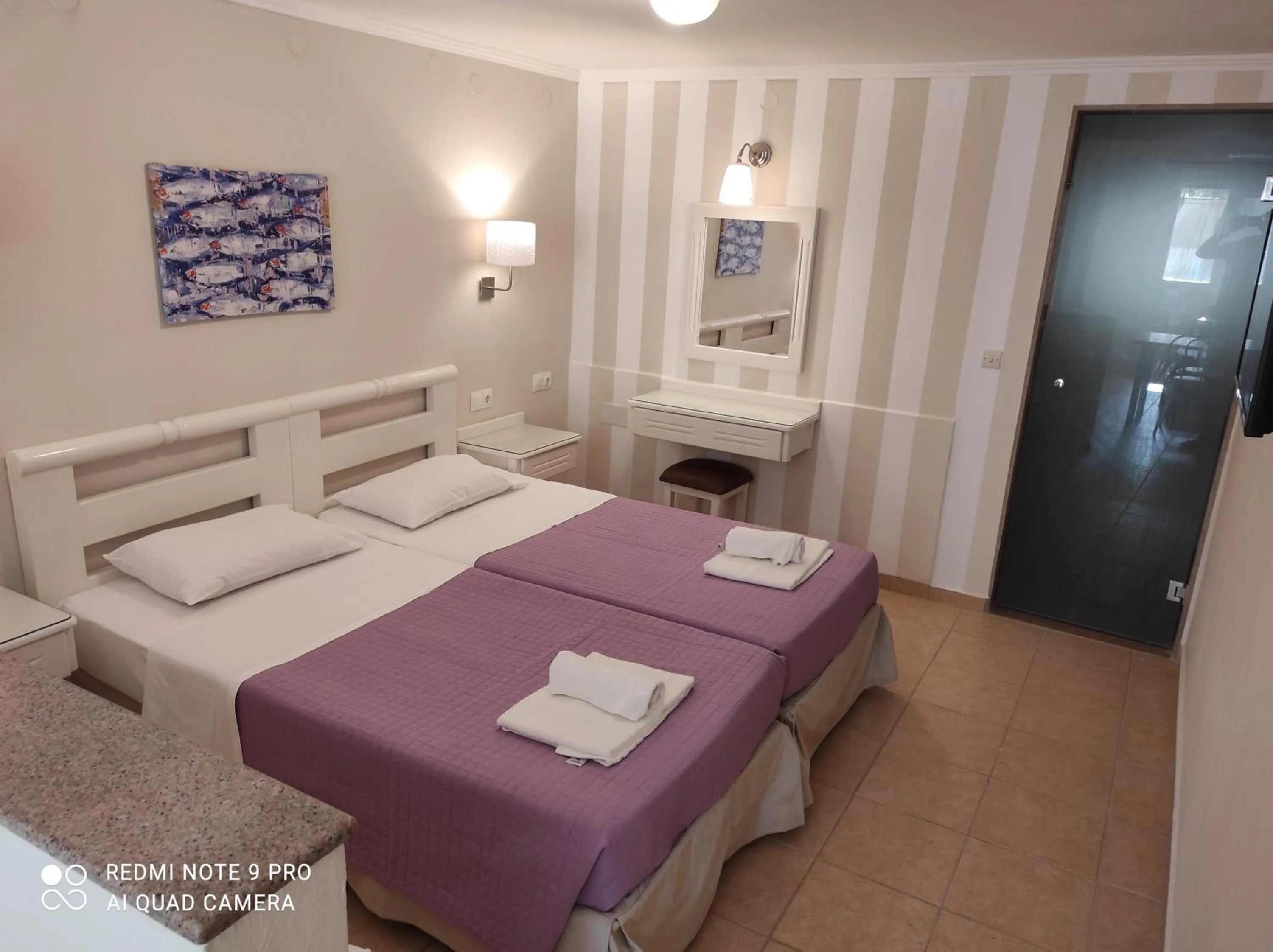 Bed in Blue Sky Apartments