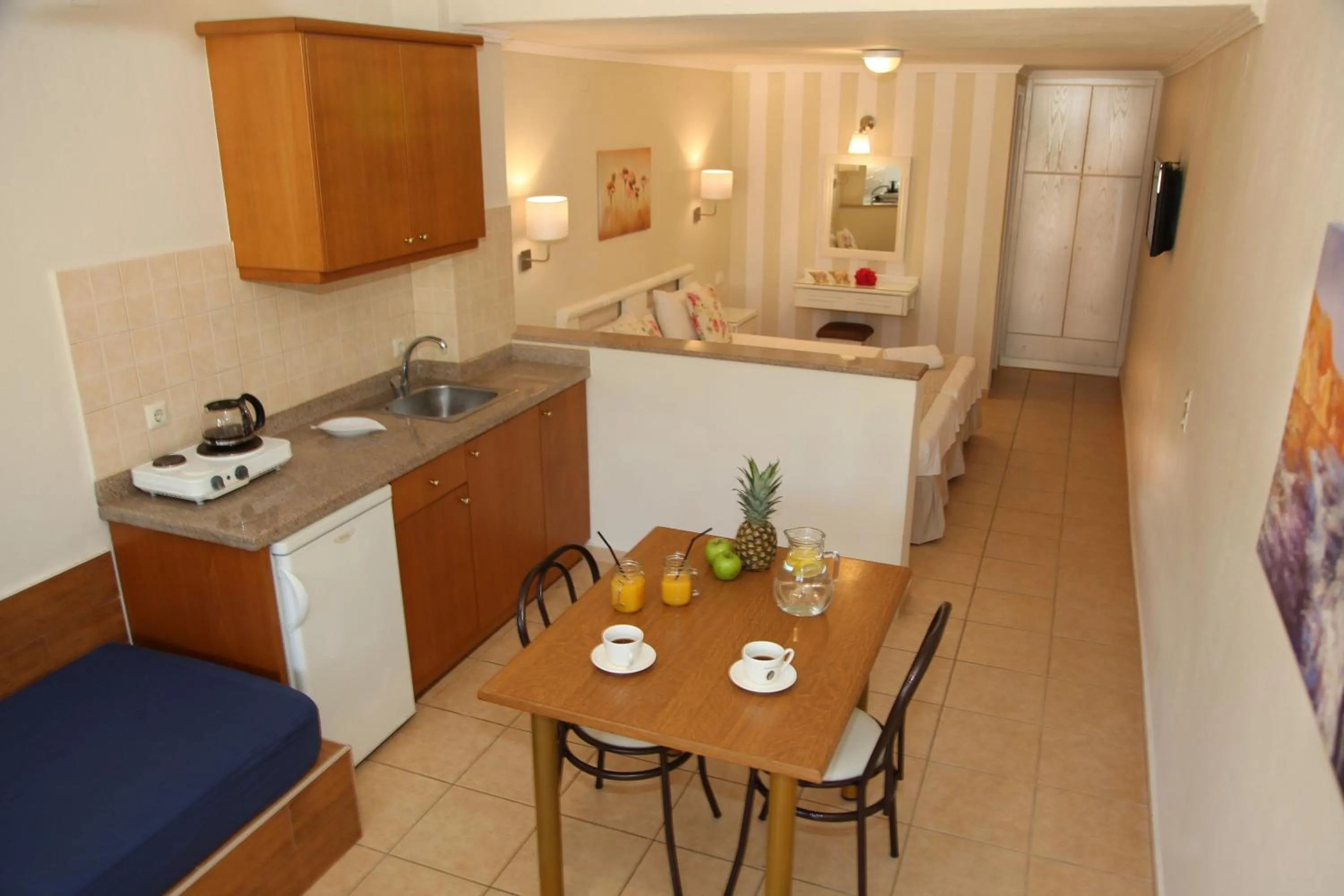 Kitchen or kitchenette in Blue Sky Apartments