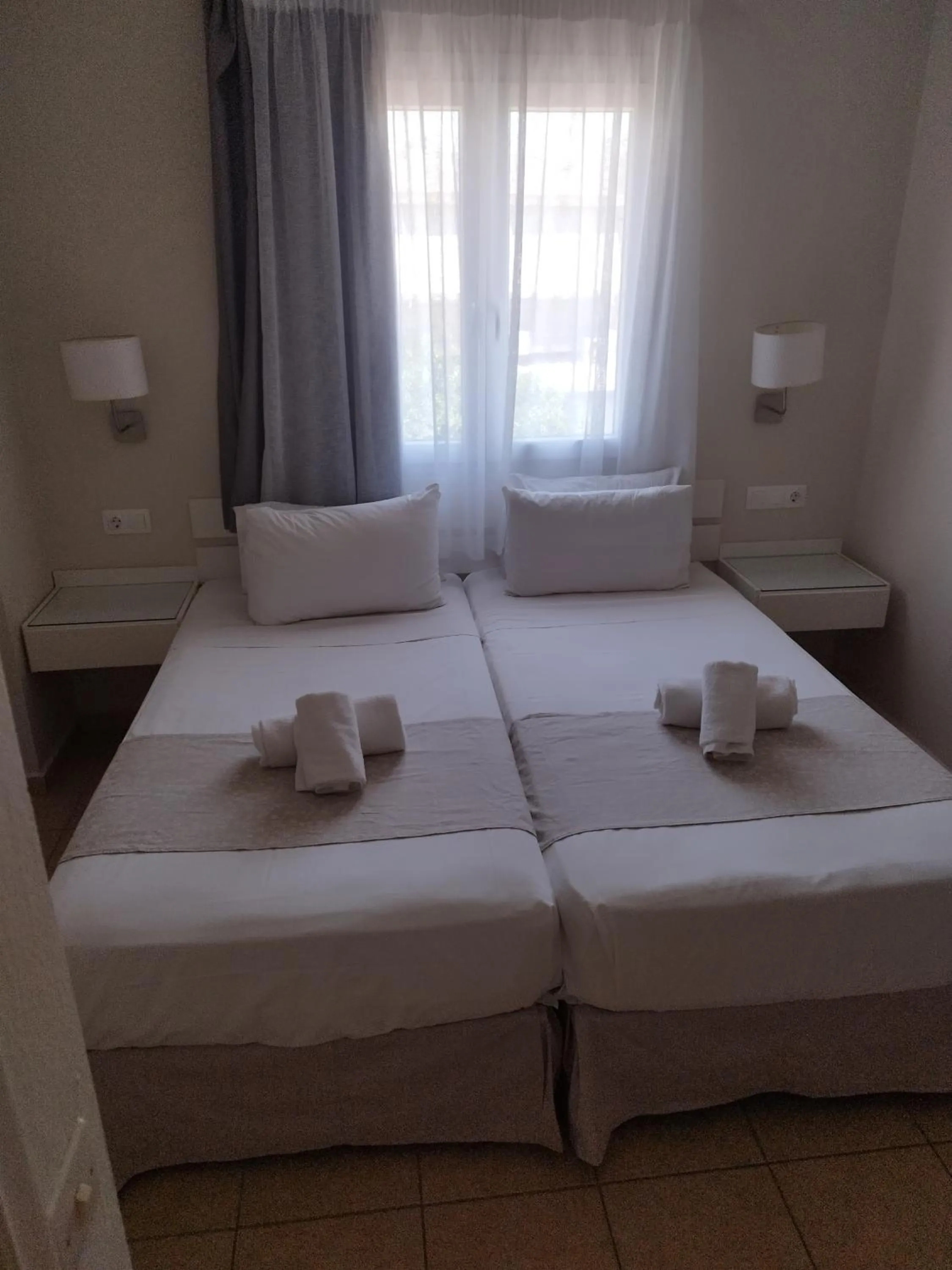 Bed in Blue Sky Apartments