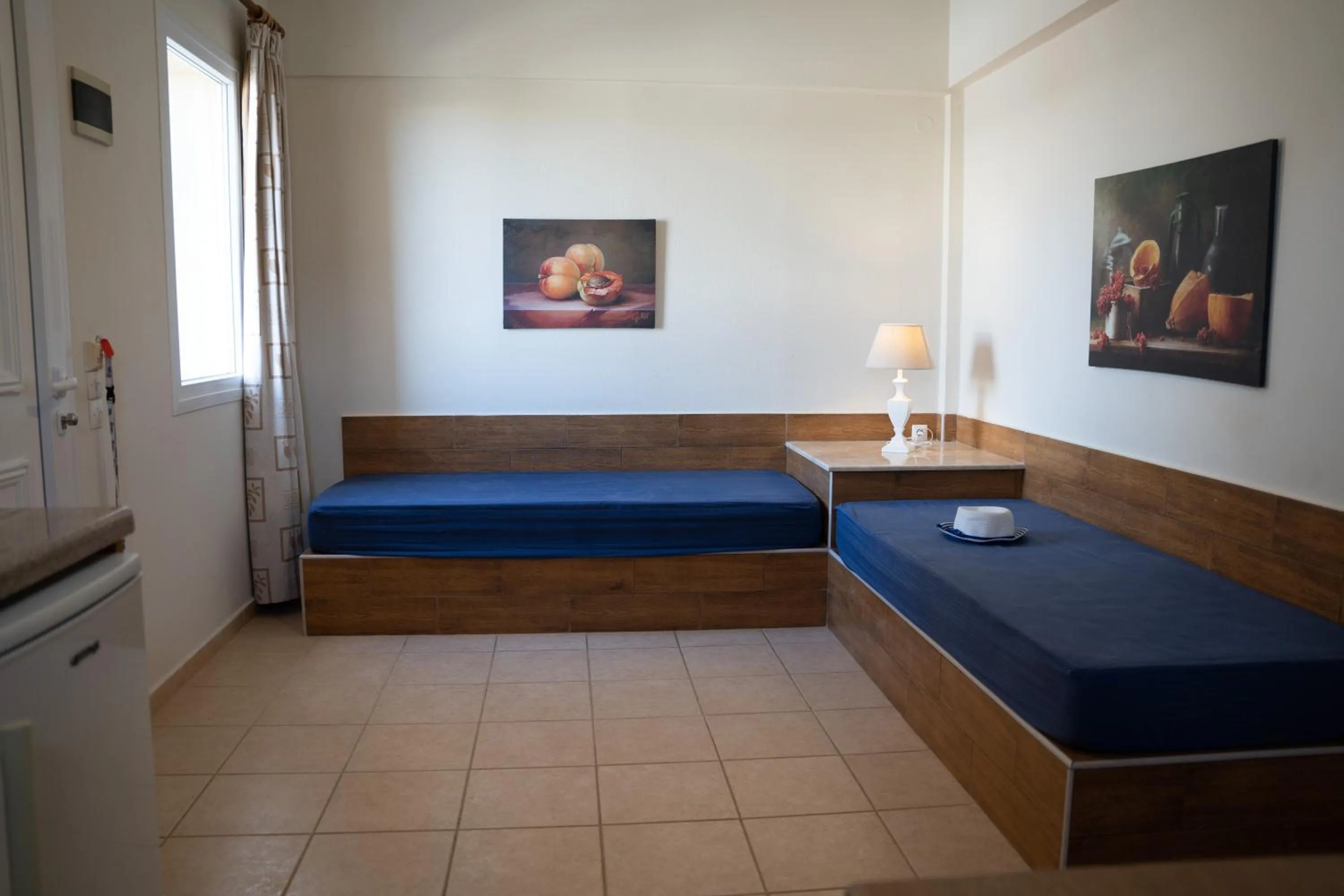 Seating area, Bed in Blue Sky Apartments