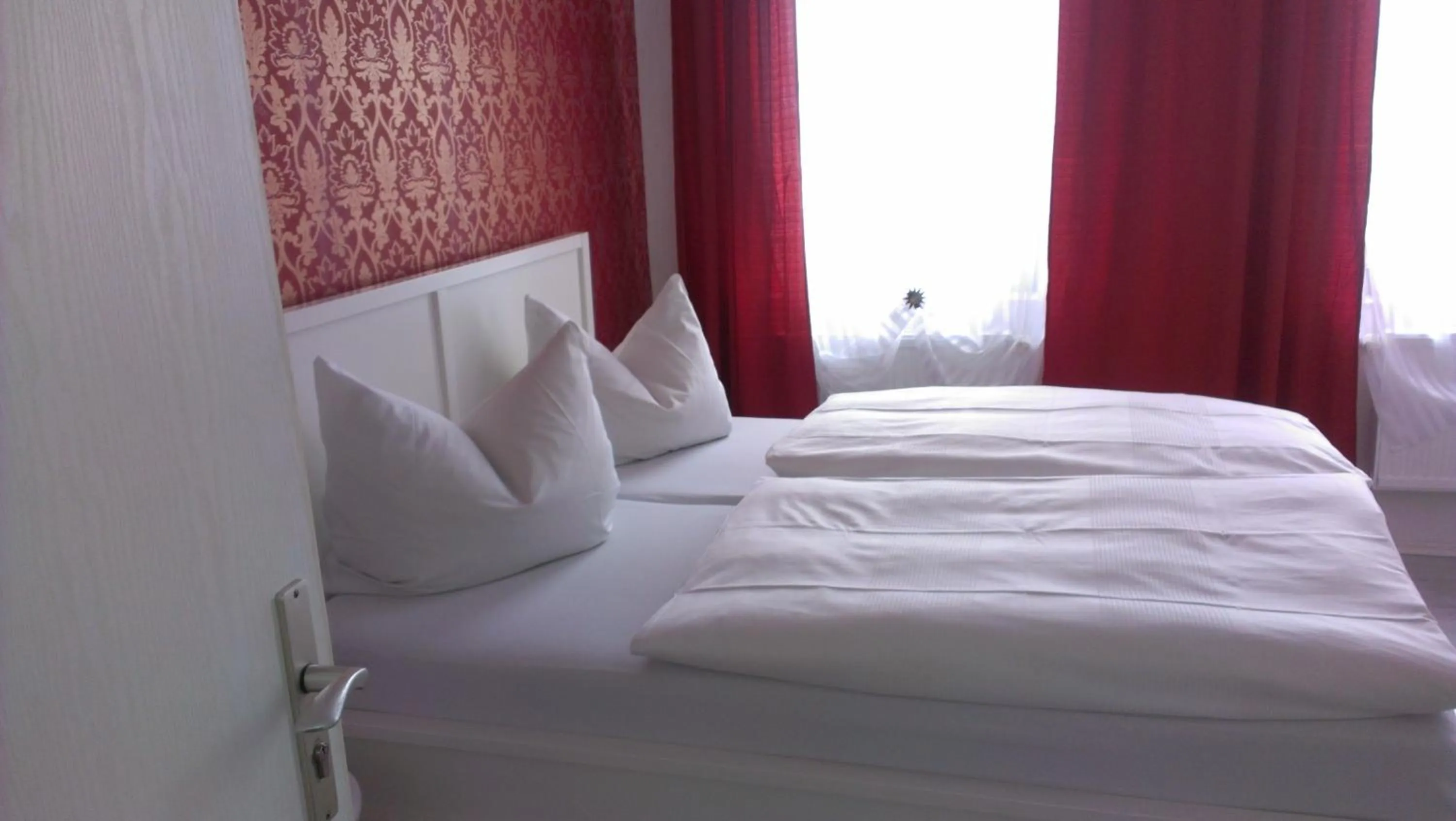 Bed in Hotel Schwanenburg