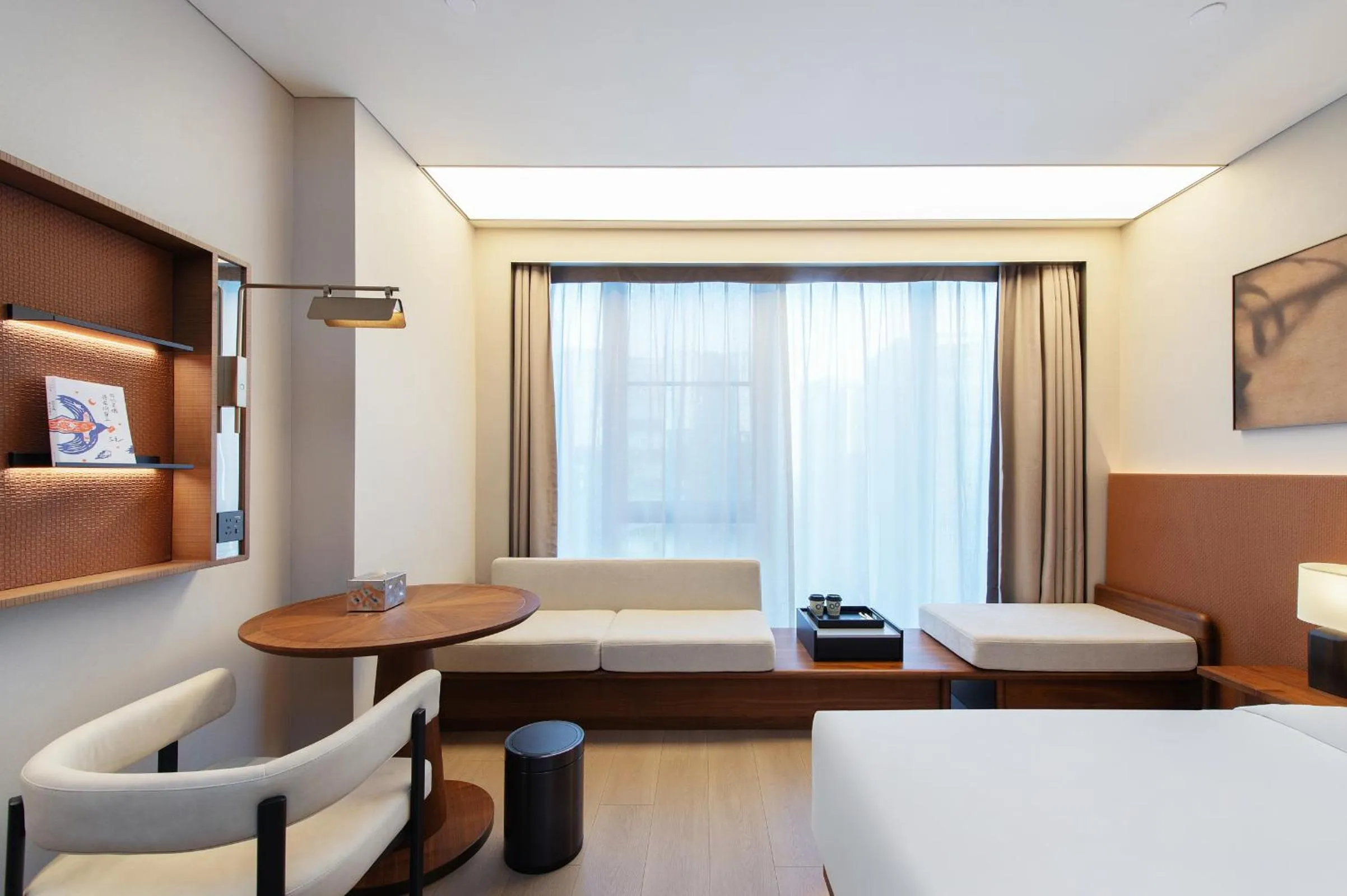 Seating area, Bed in Novotel Xiamen International Convention Center