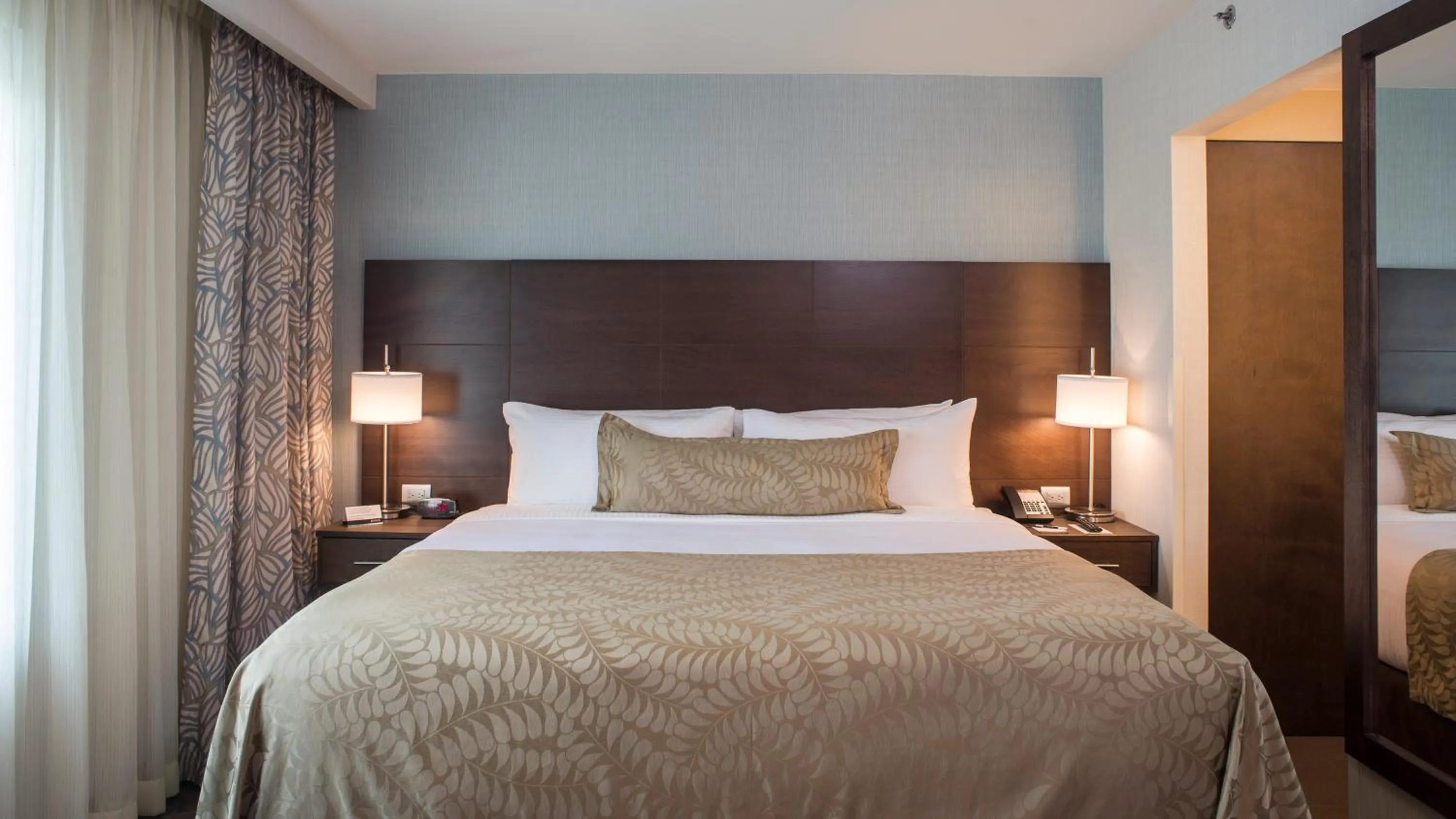 Photo of the whole room, Bed in Staybridge Suites Puebla by IHG