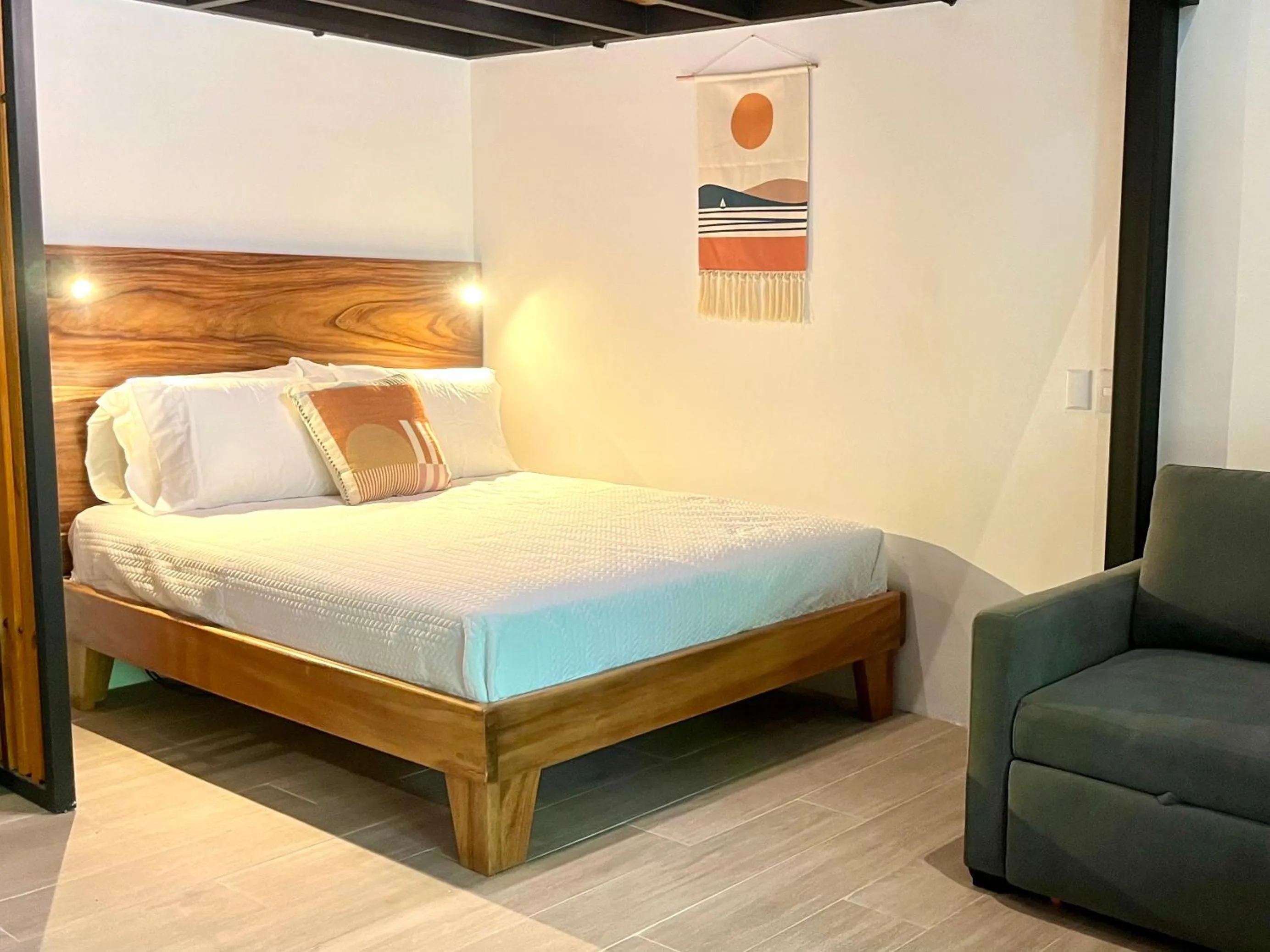 Bed in Makanas Beach Bungalows