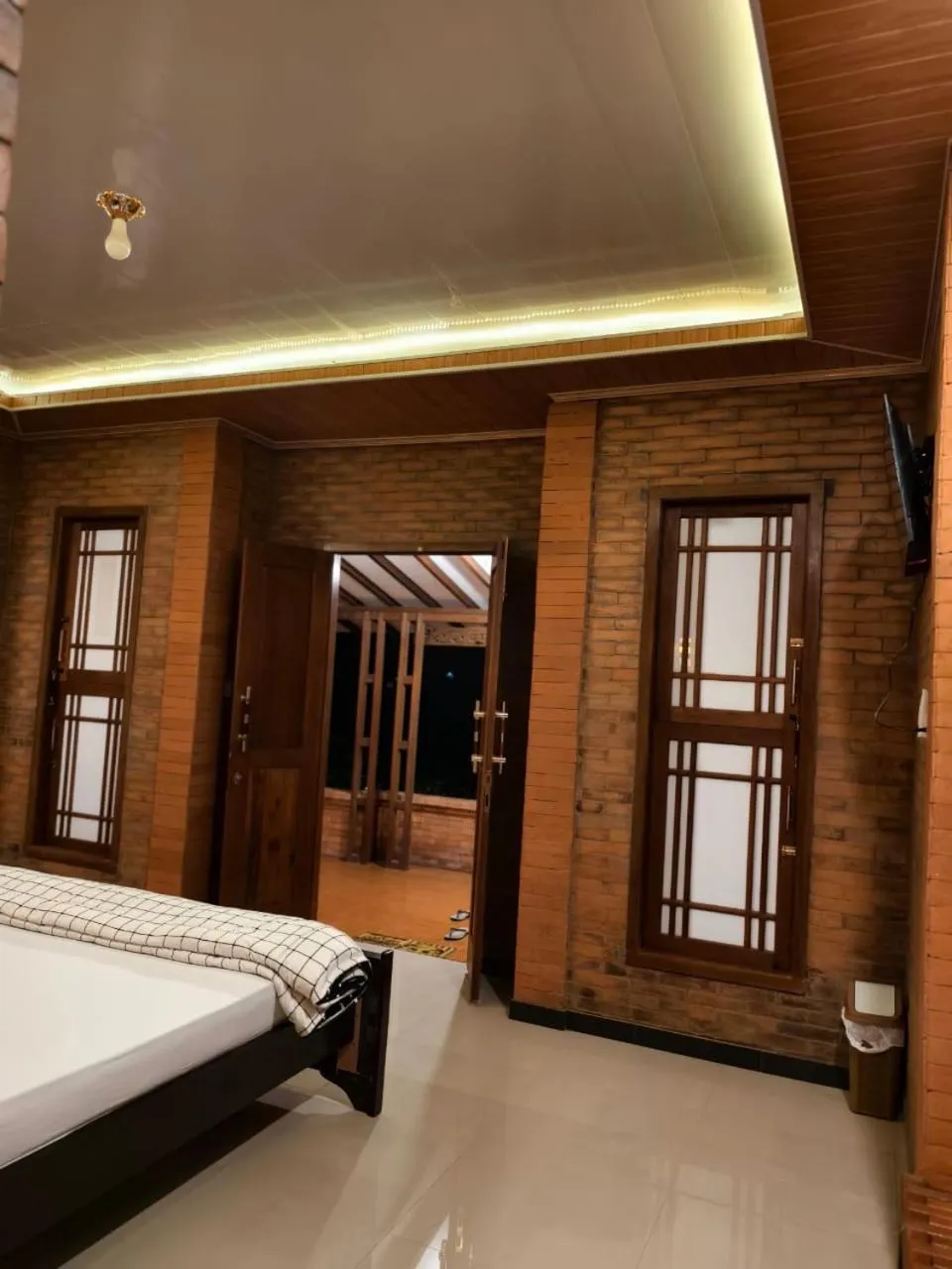 Bed in Lotus 2 Guest House