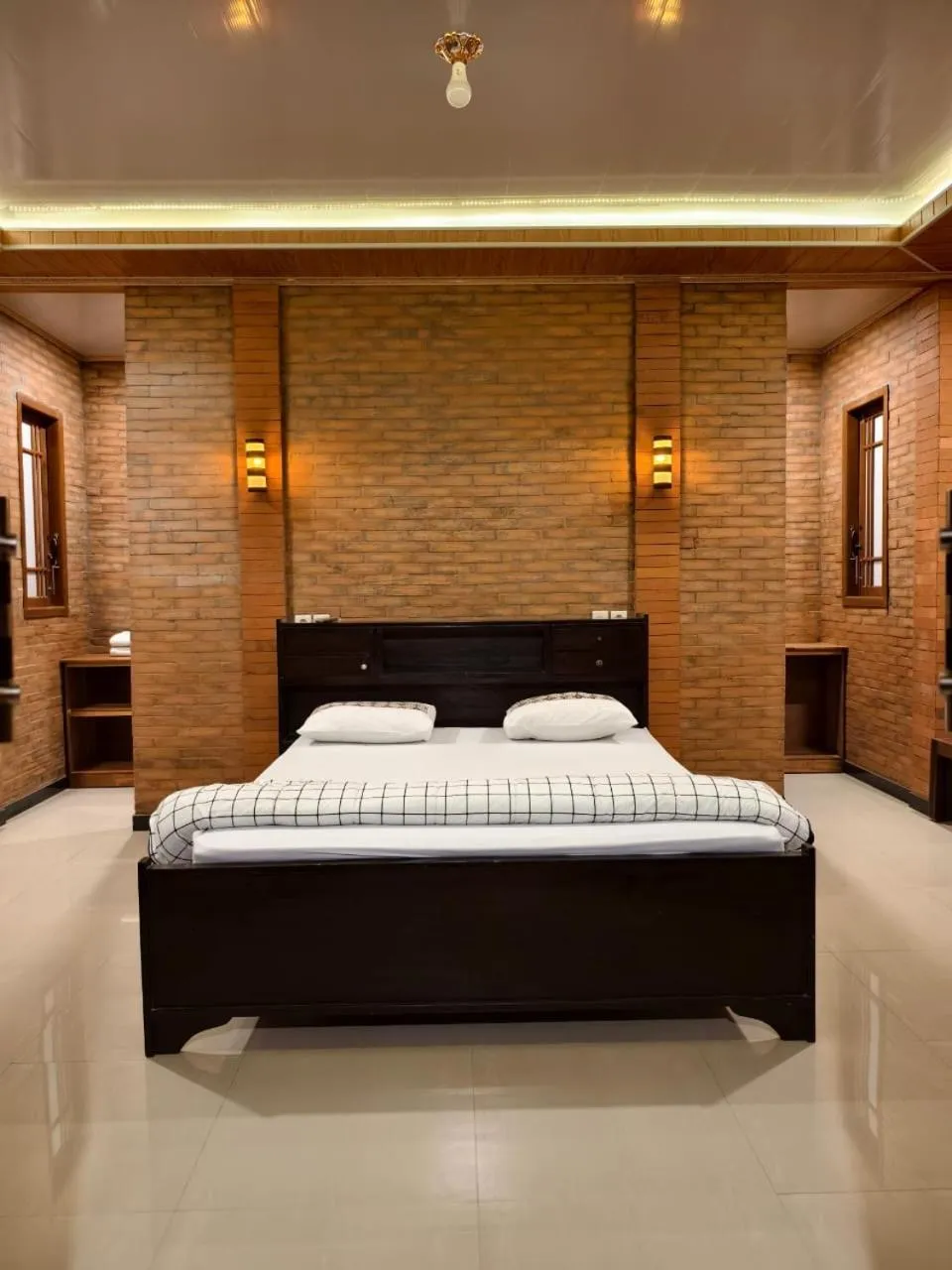 Bed in Lotus 2 Guest House