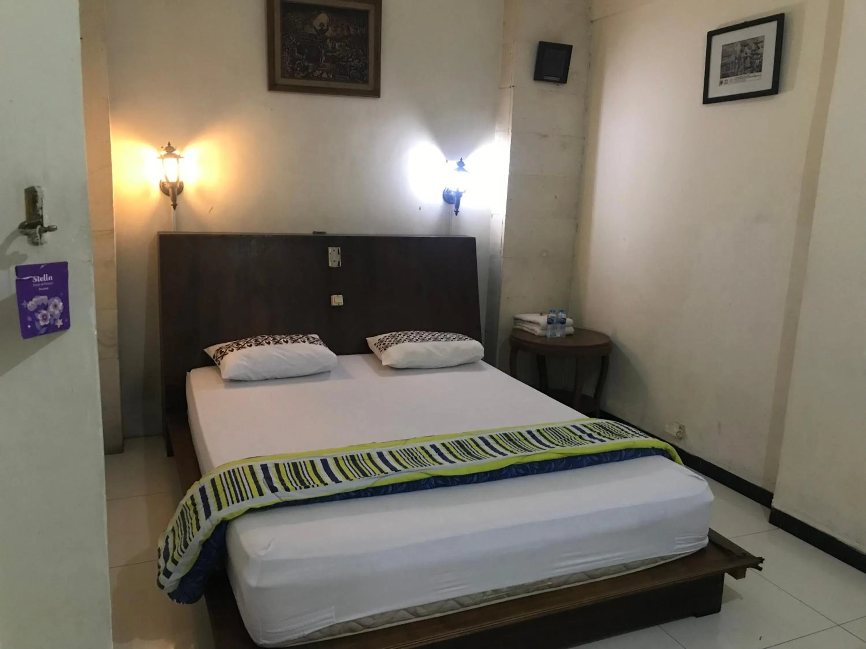 Bed in Lotus 2 Guest House