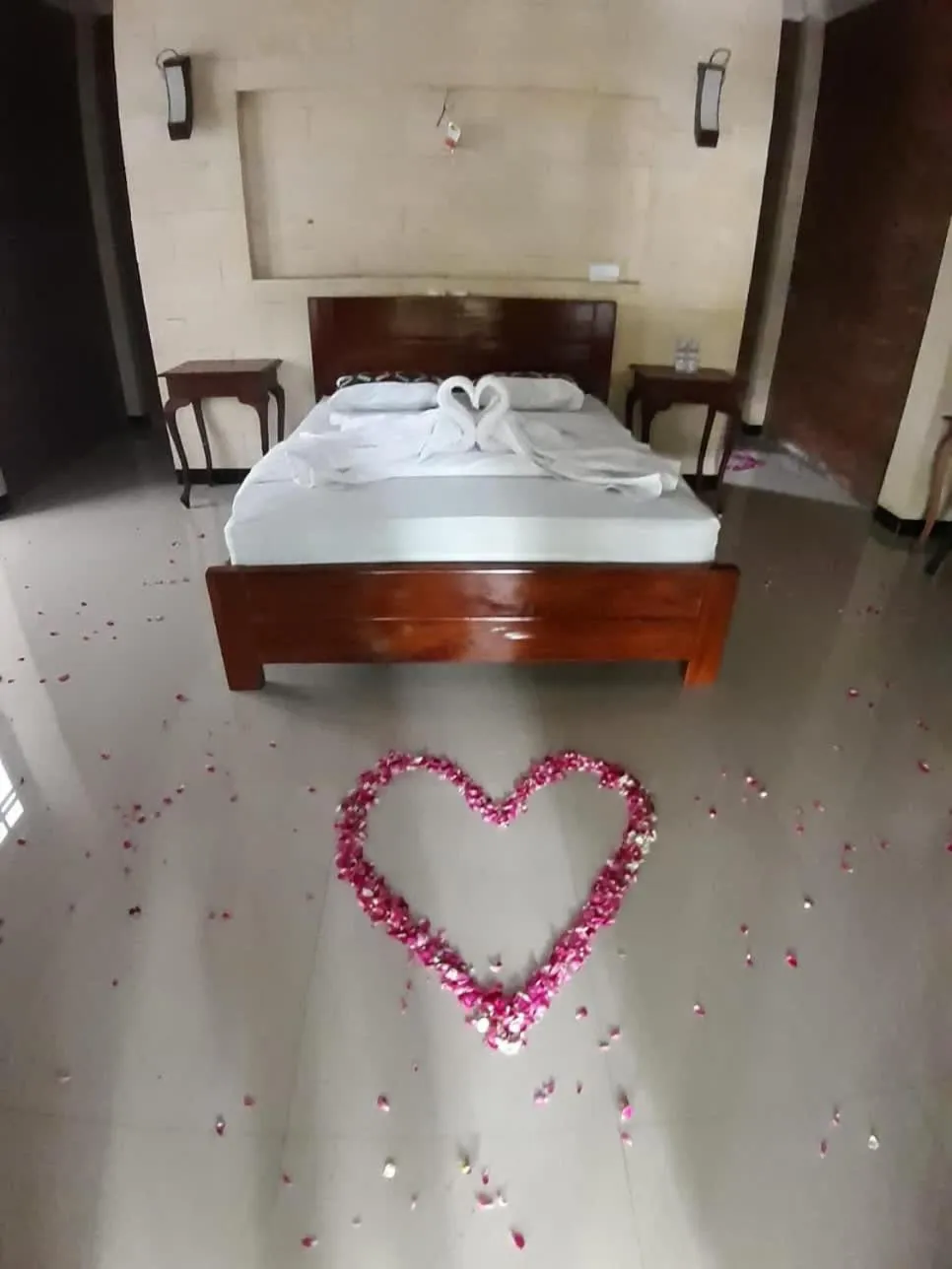 Bed in Lotus 2 Guest House