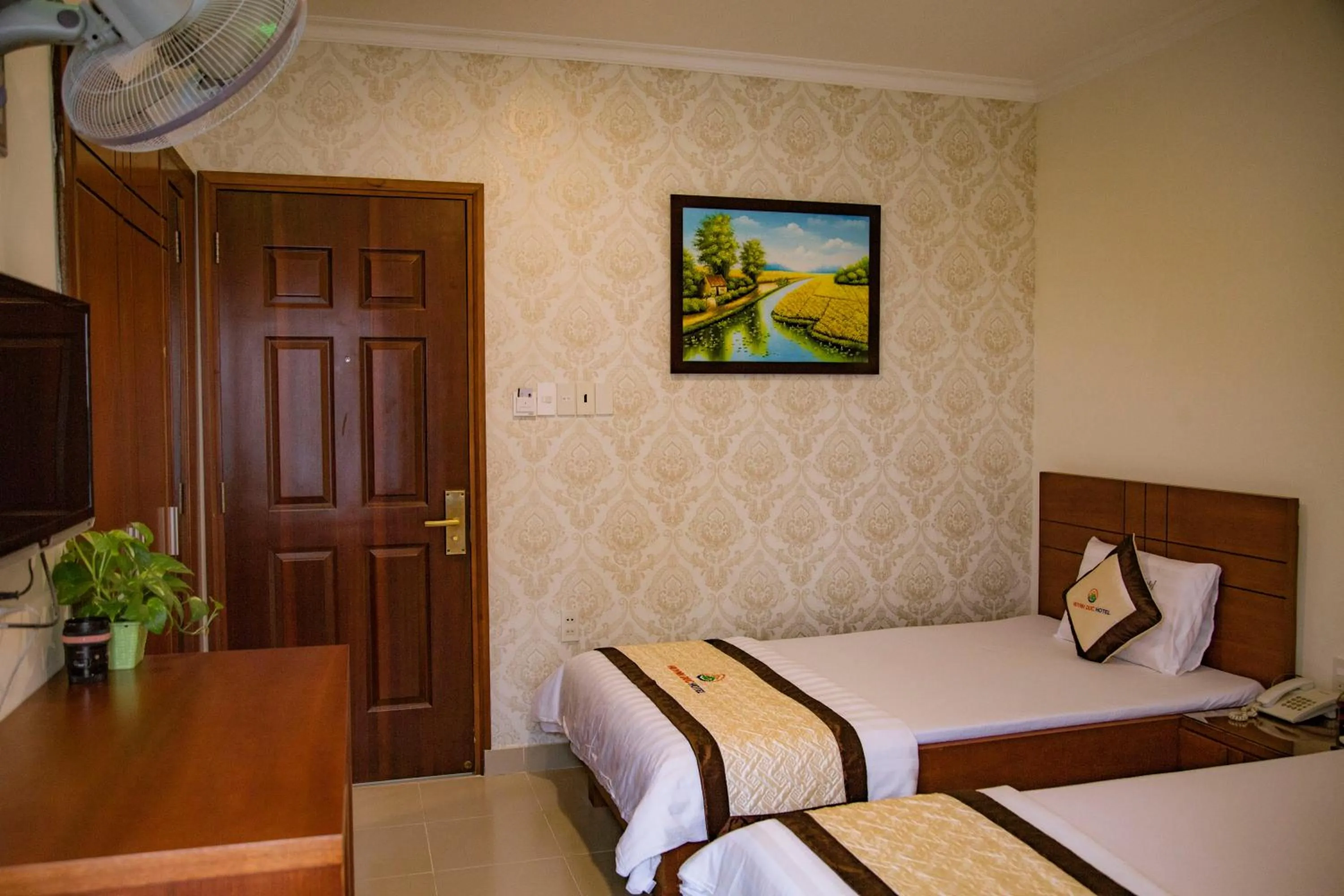 Bed in Huynh Duc Hotel