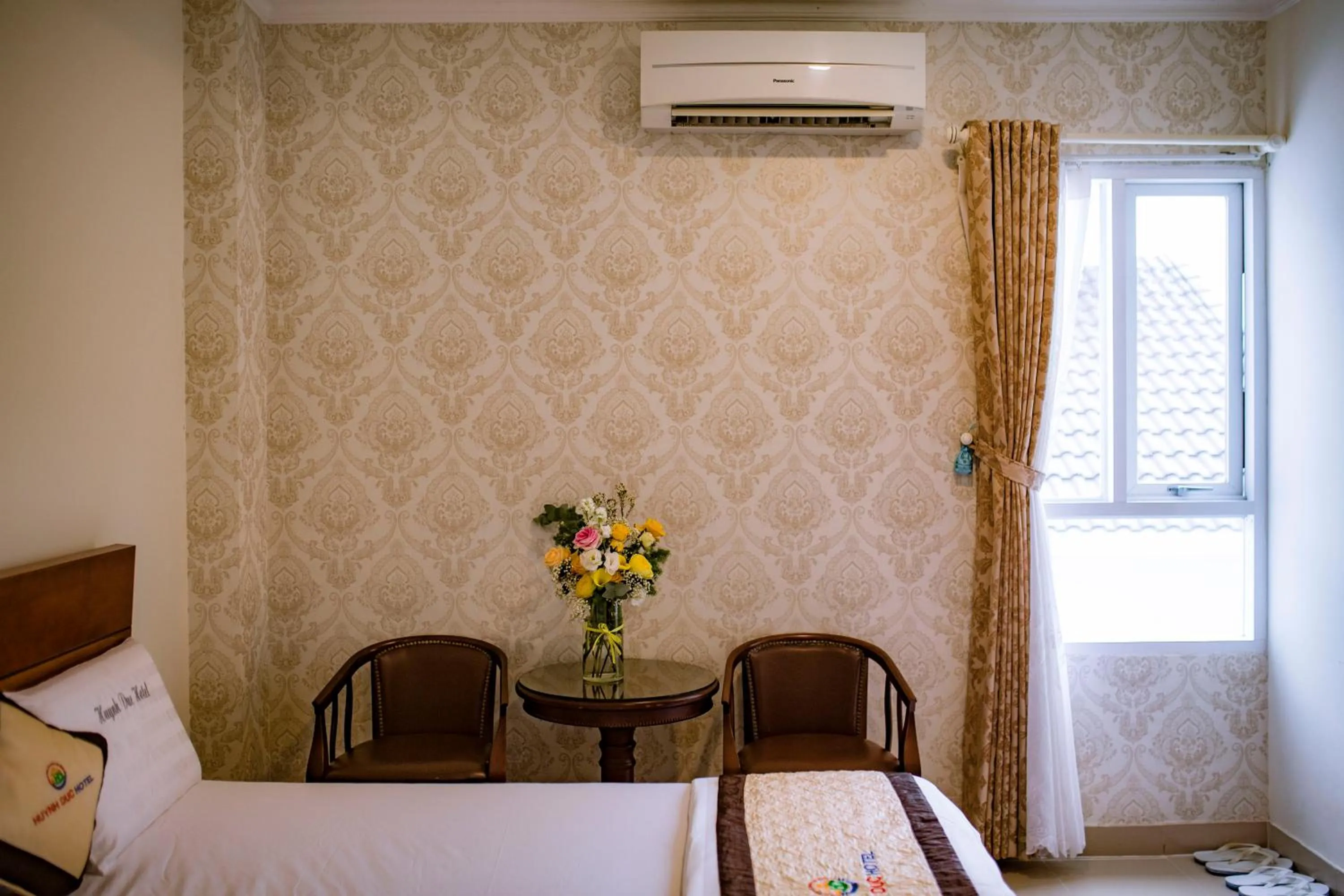 Bed in Huynh Duc Hotel