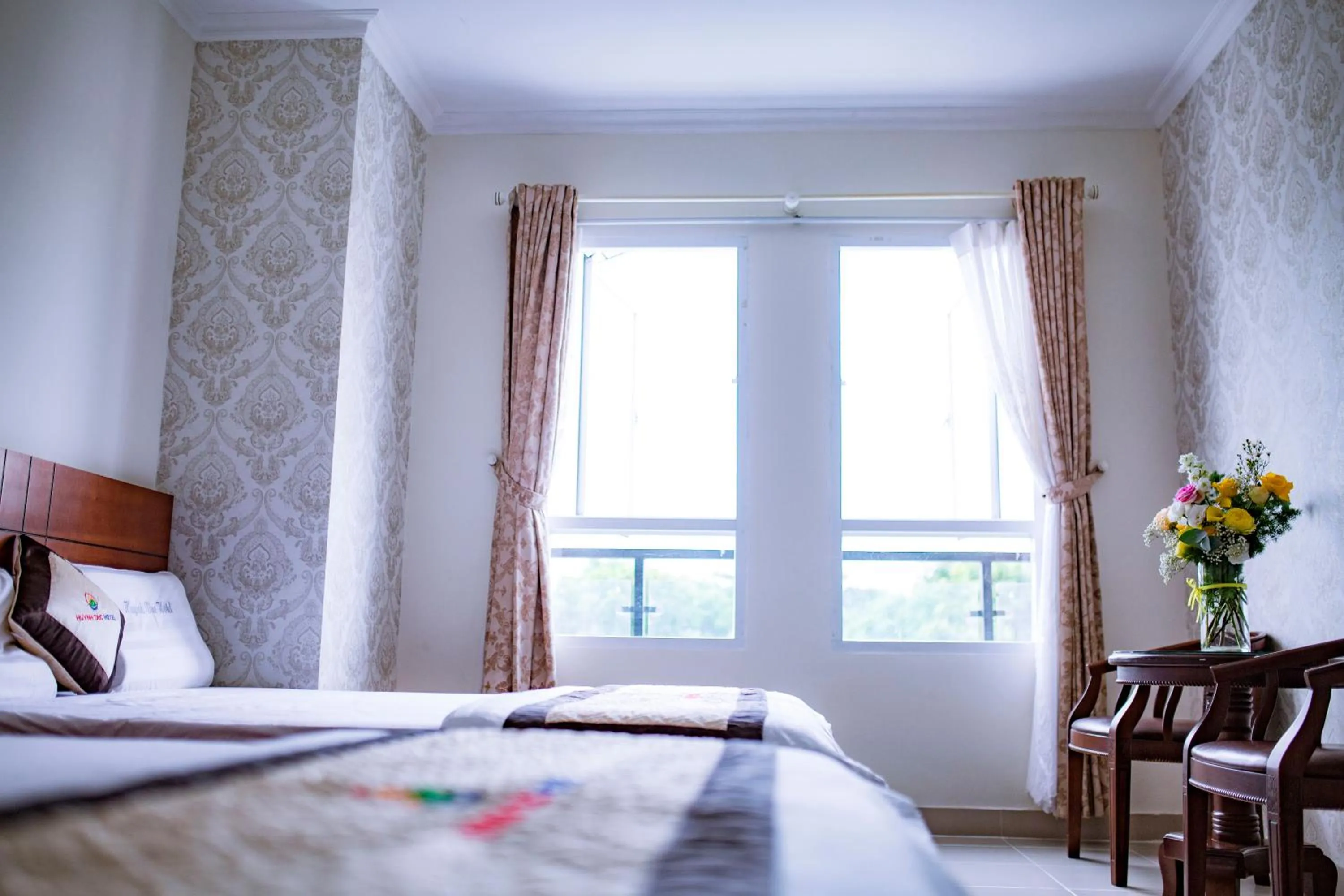 Bed in Huynh Duc Hotel