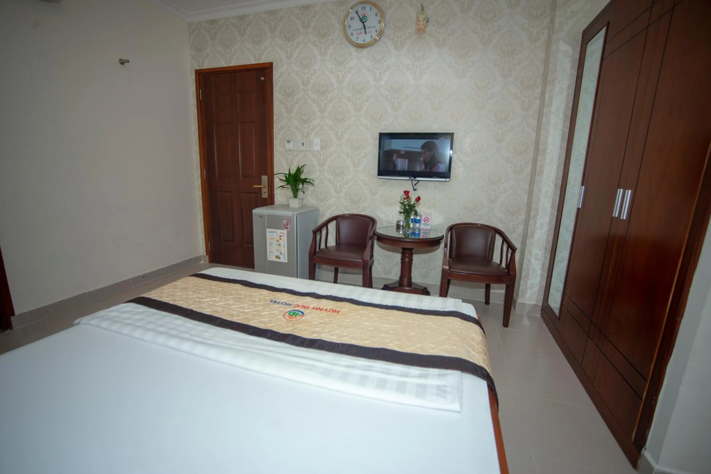 Bed in Huynh Duc Hotel