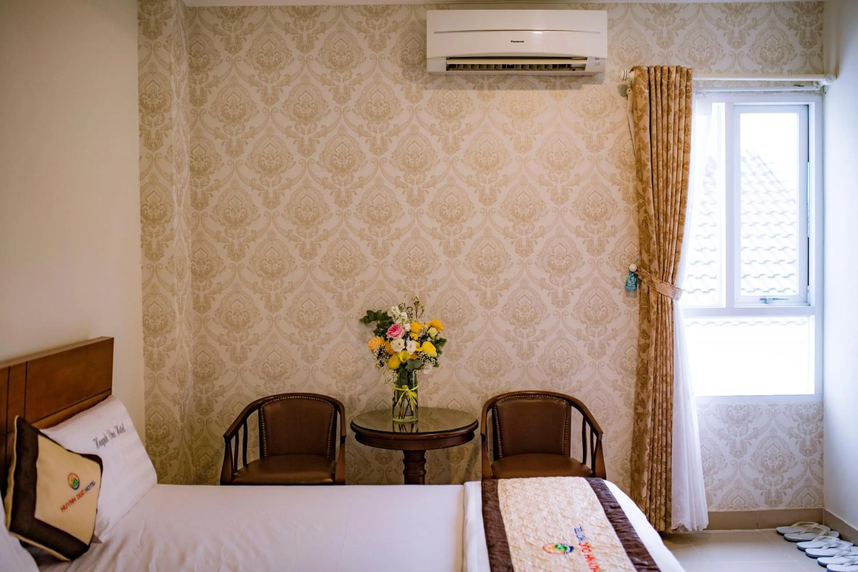 Bed in Huynh Duc Hotel