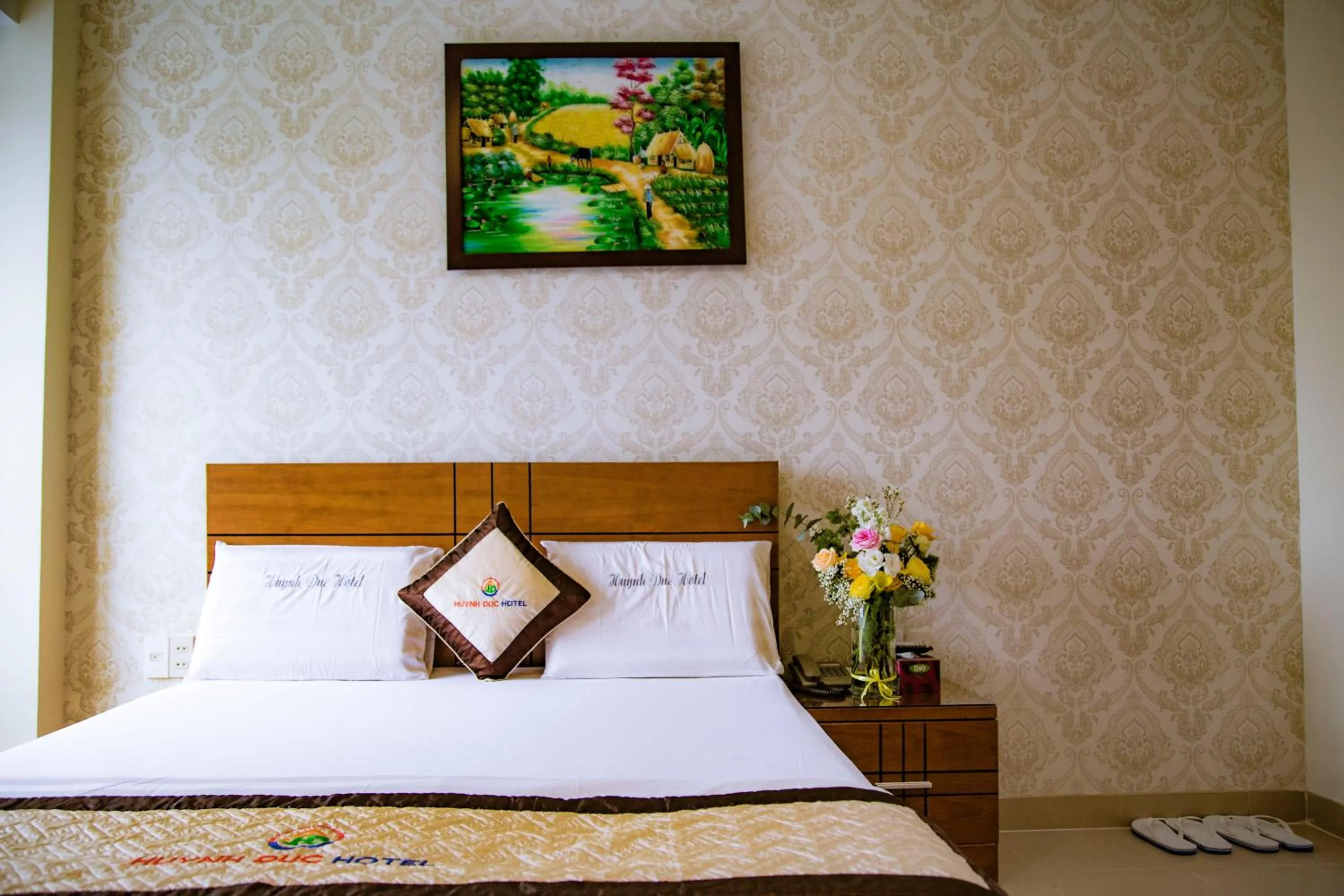 Bed in Huynh Duc Hotel