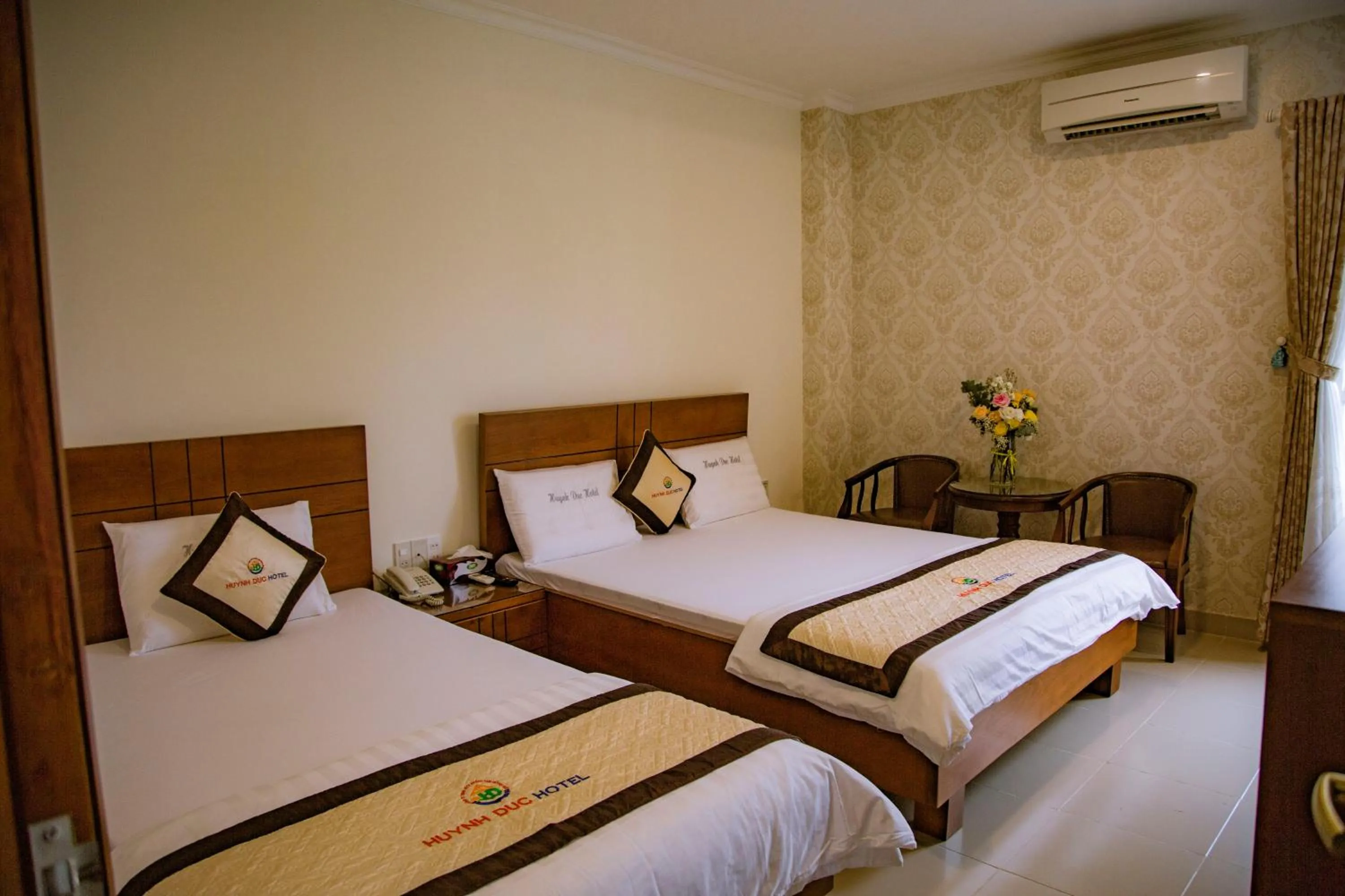 Bed in Huynh Duc Hotel
