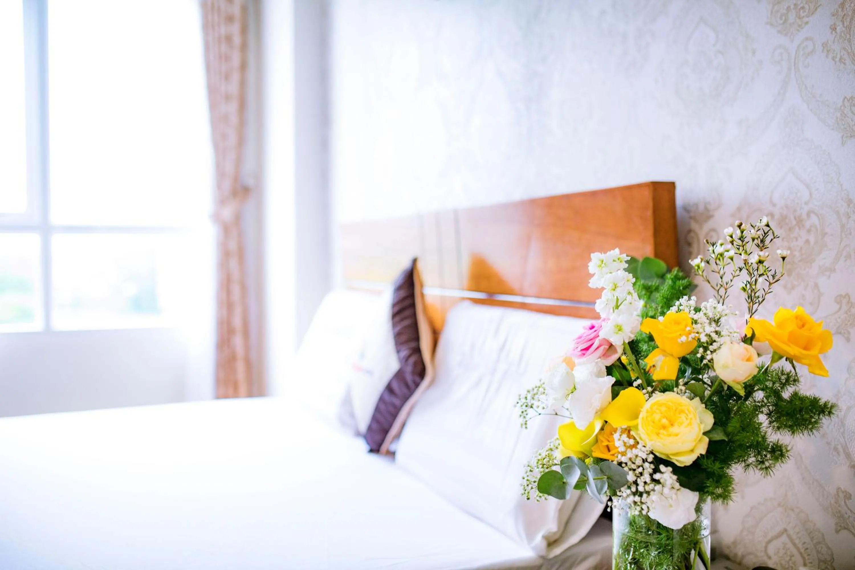 Bed in Huynh Duc Hotel