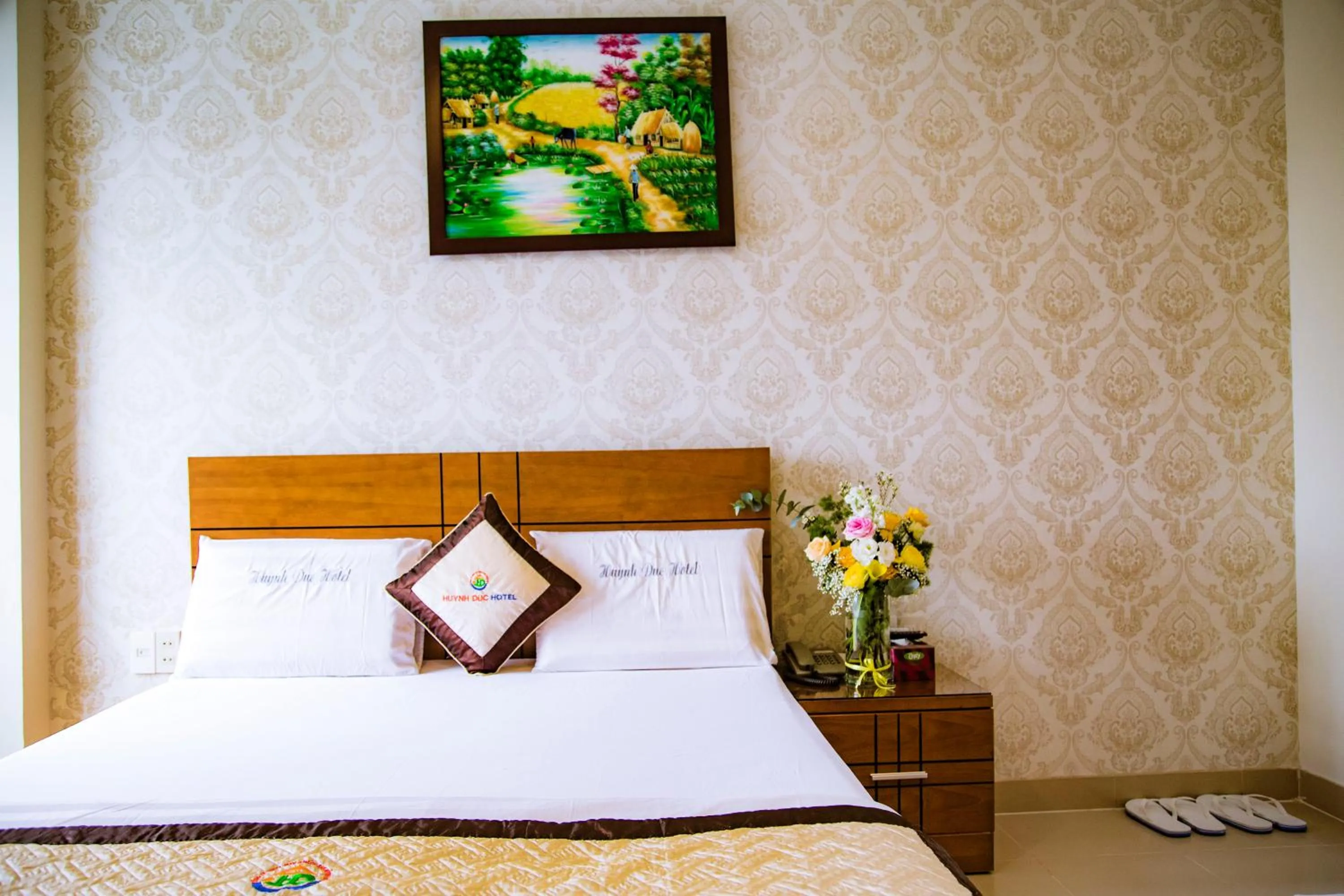 Bed in Huynh Duc Hotel