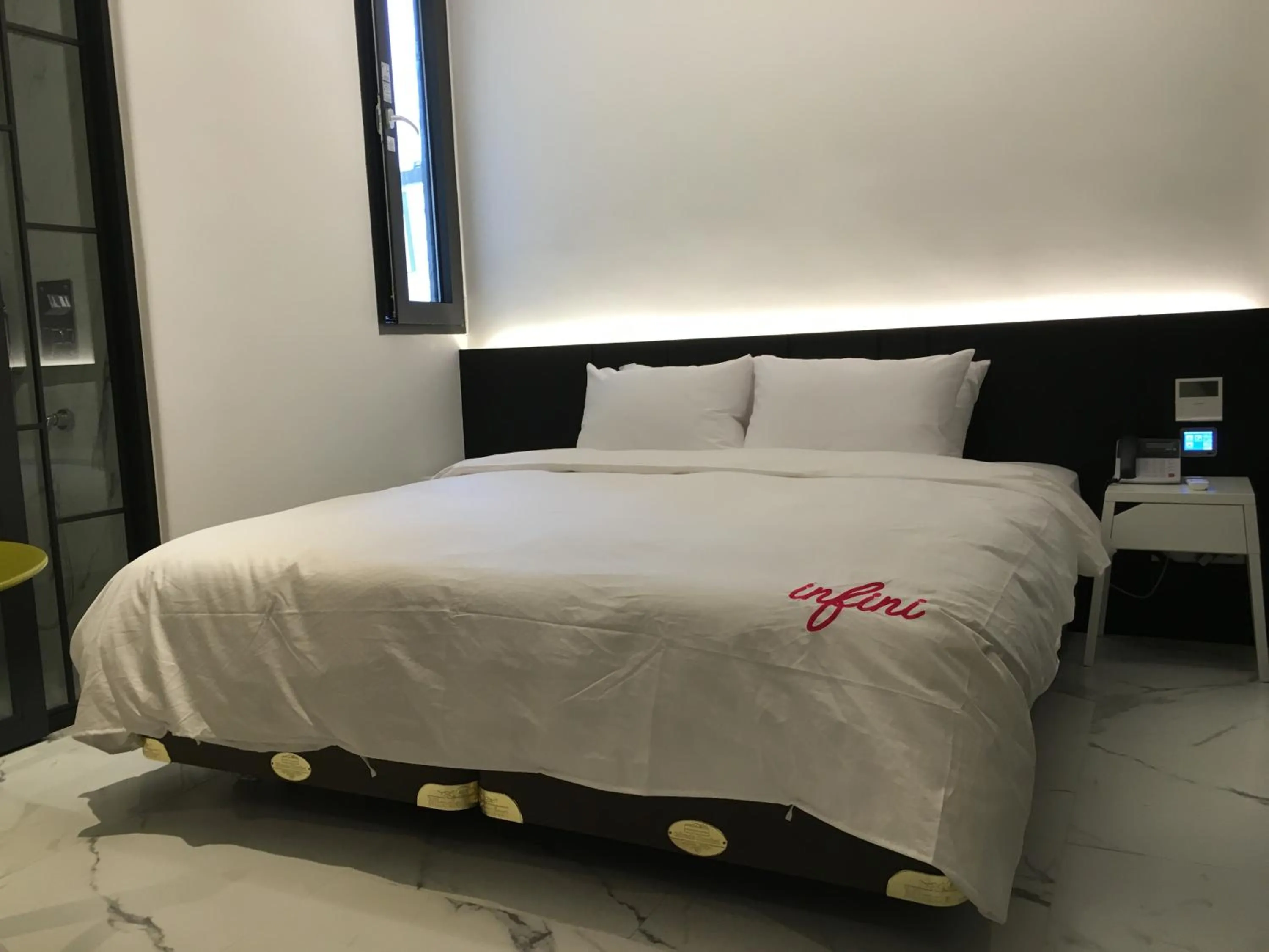 Bed in Hotel Infini