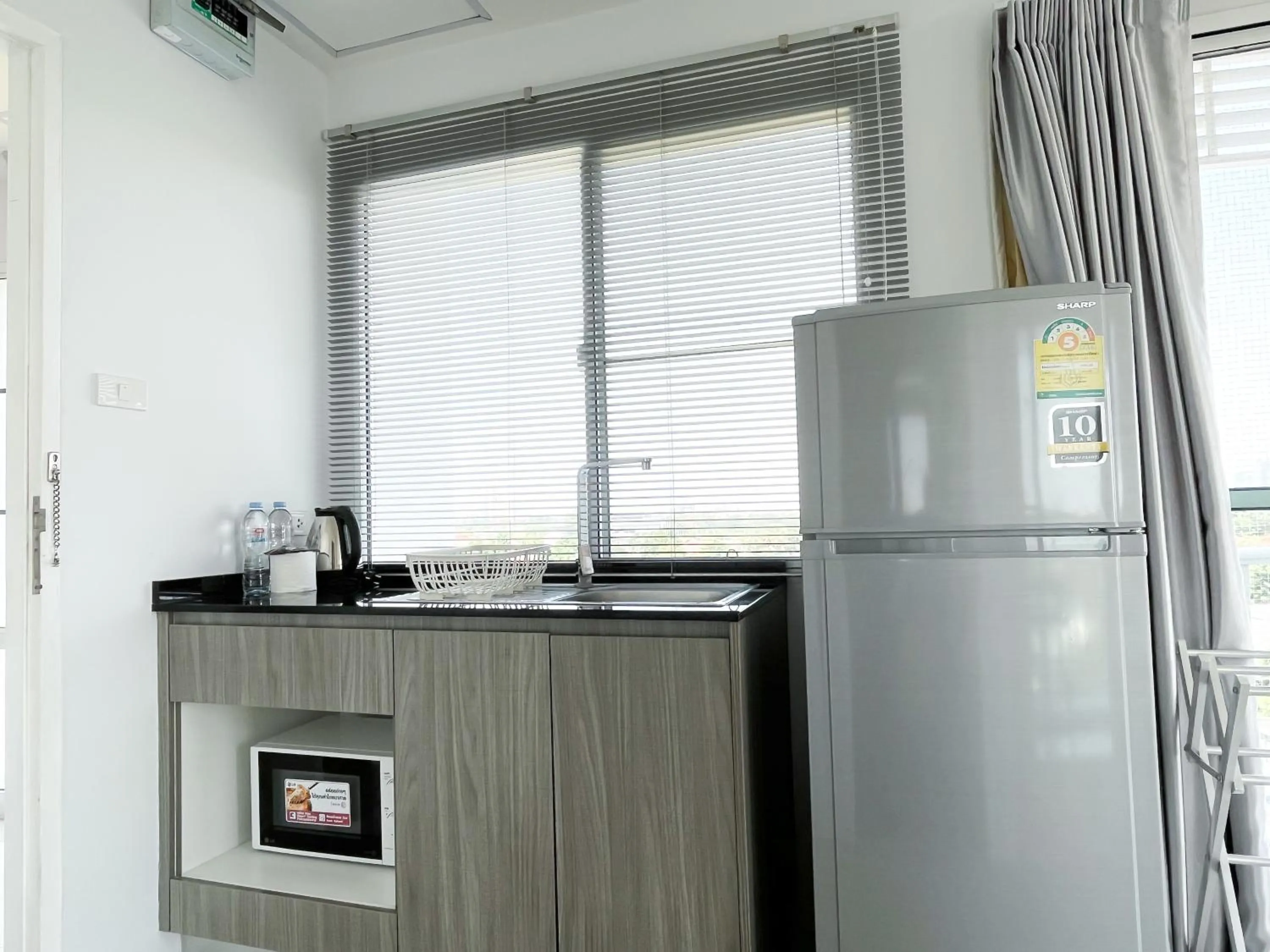 Kitchen or kitchenette in Des Res Hotel and Residence