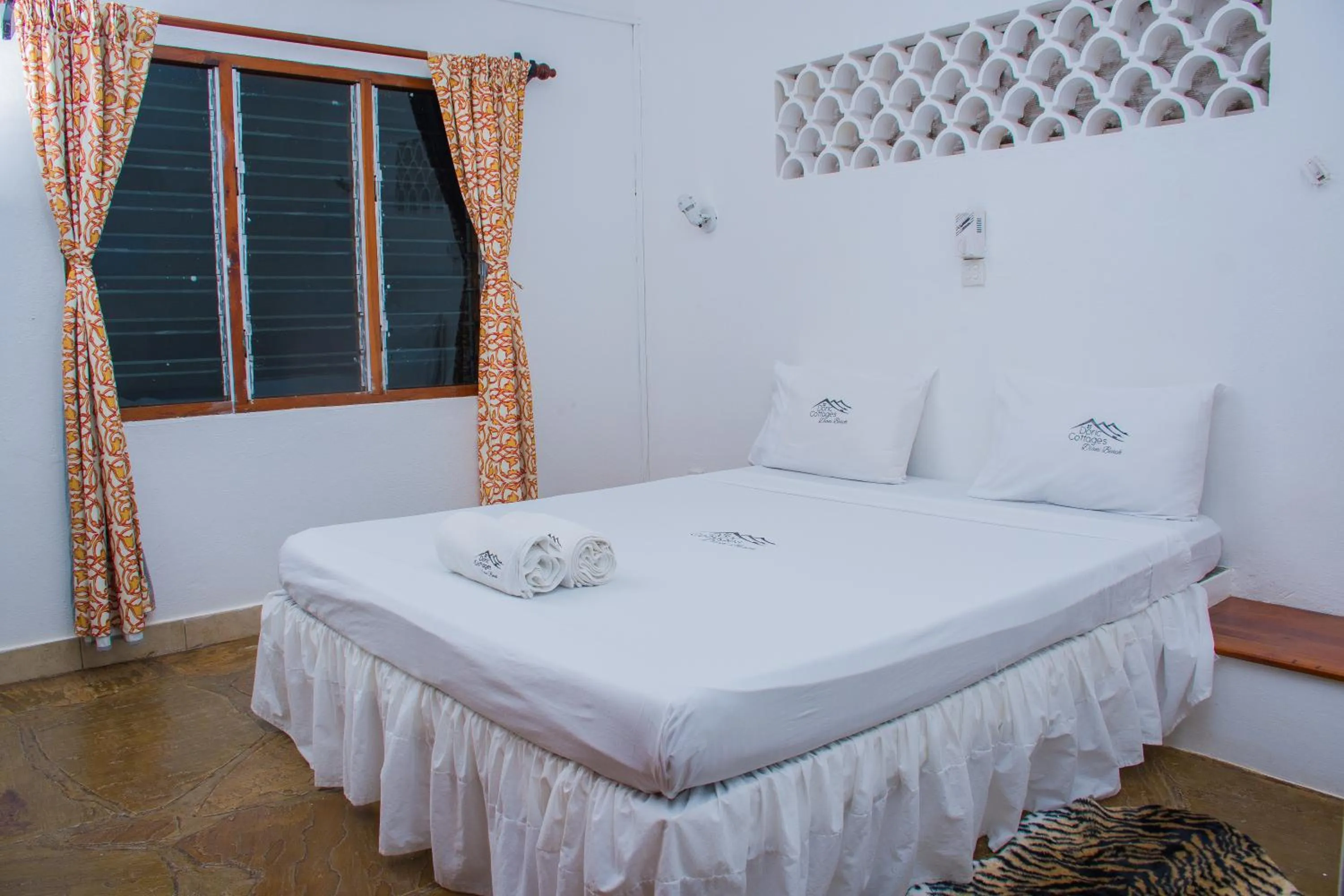 Bed in Doric Cottages Diani