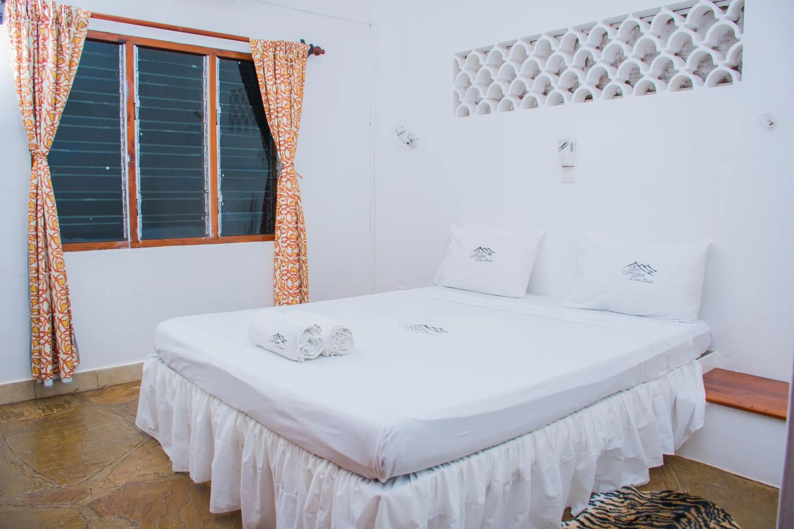 Bed in Doric Cottages Diani