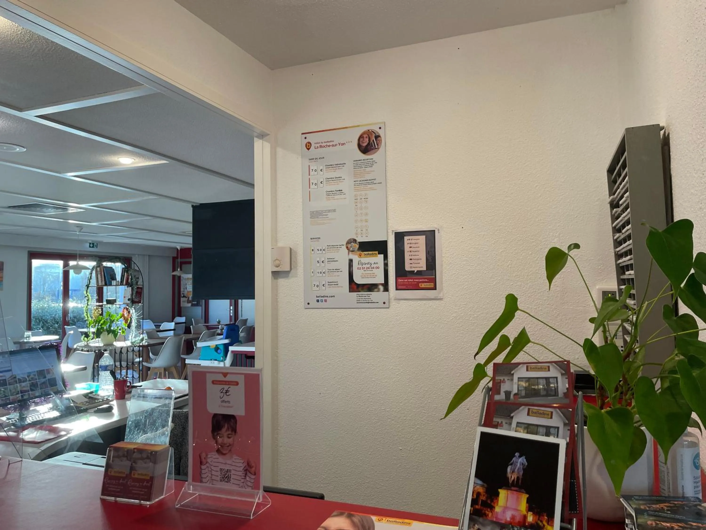 Lobby or reception in initial by balladins La Roche-sur-Yon