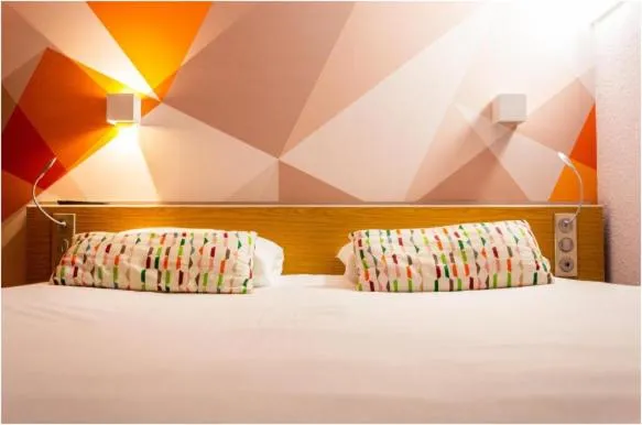 Bed in initial by balladins La Roche-sur-Yon