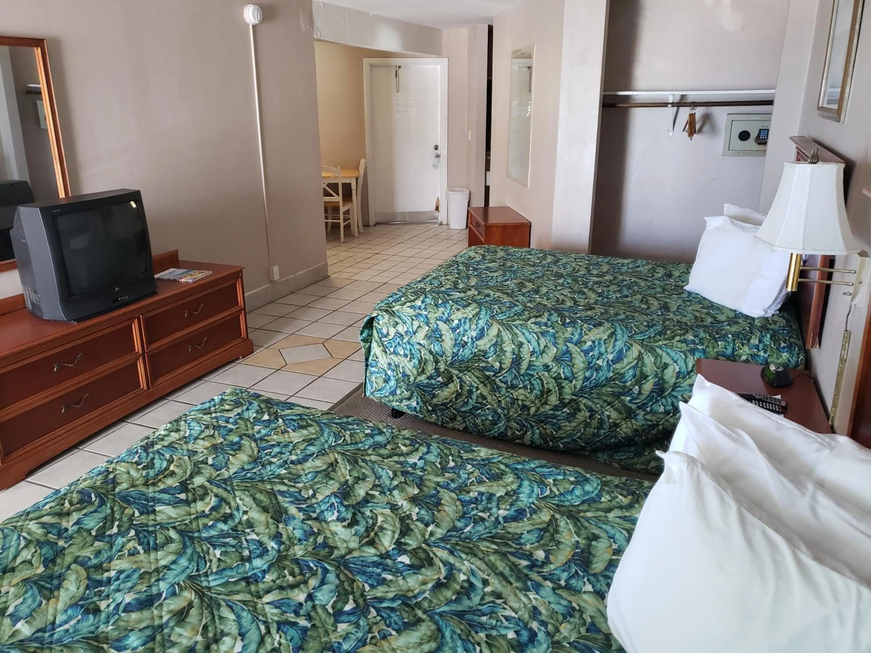 Bed in SeaScape Inn - Daytona Beach Shores