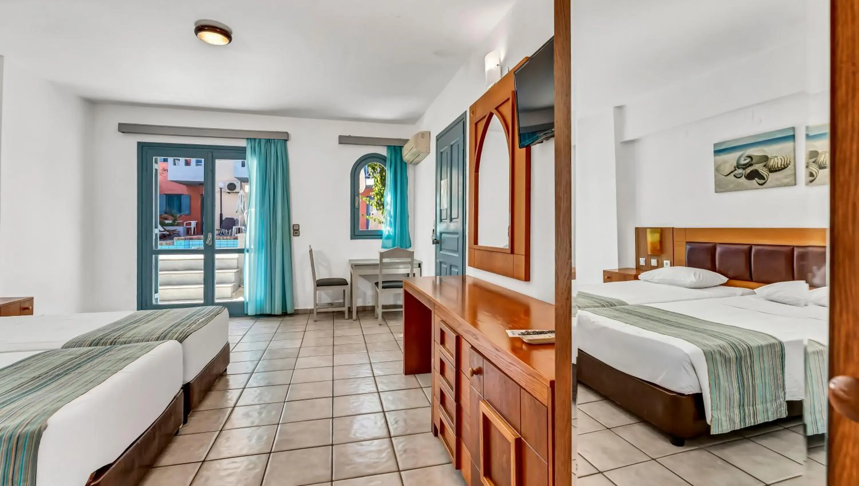 Double Room Pool View in Marilisa Hotel Double Room Pool View in Marilisa Hotel