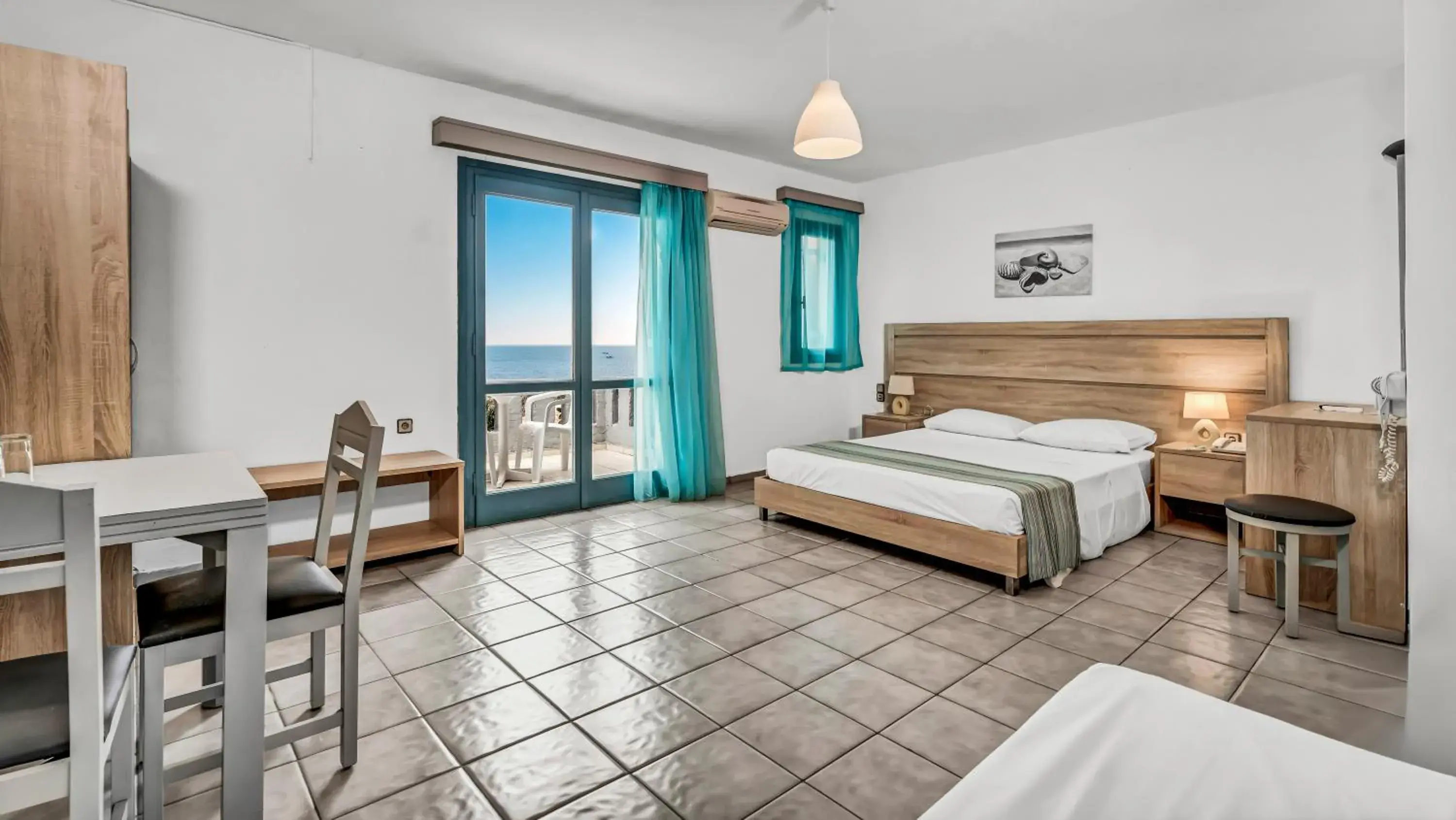 Triple Room Side Sea View in Marilisa Hotel Triple Room Side Sea View in Marilisa Hotel